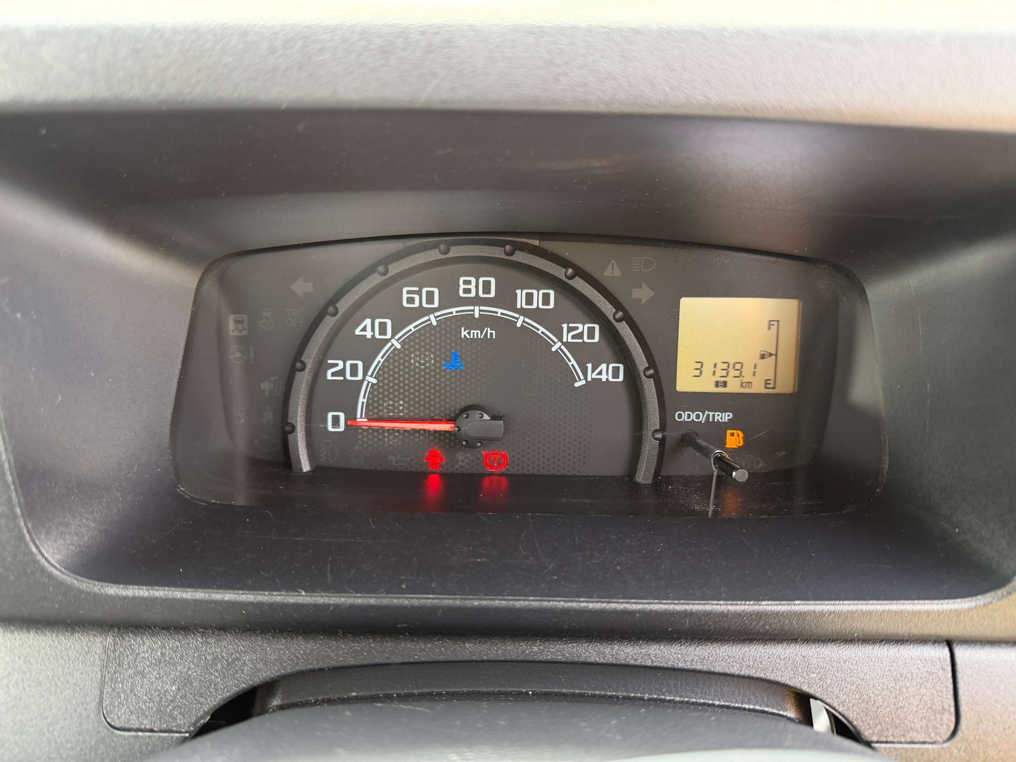 Dashboard of 2021 Daihatsu Hijet Truck 660 Jumbo SA IIIt displaying speedometer and odometer readings.
