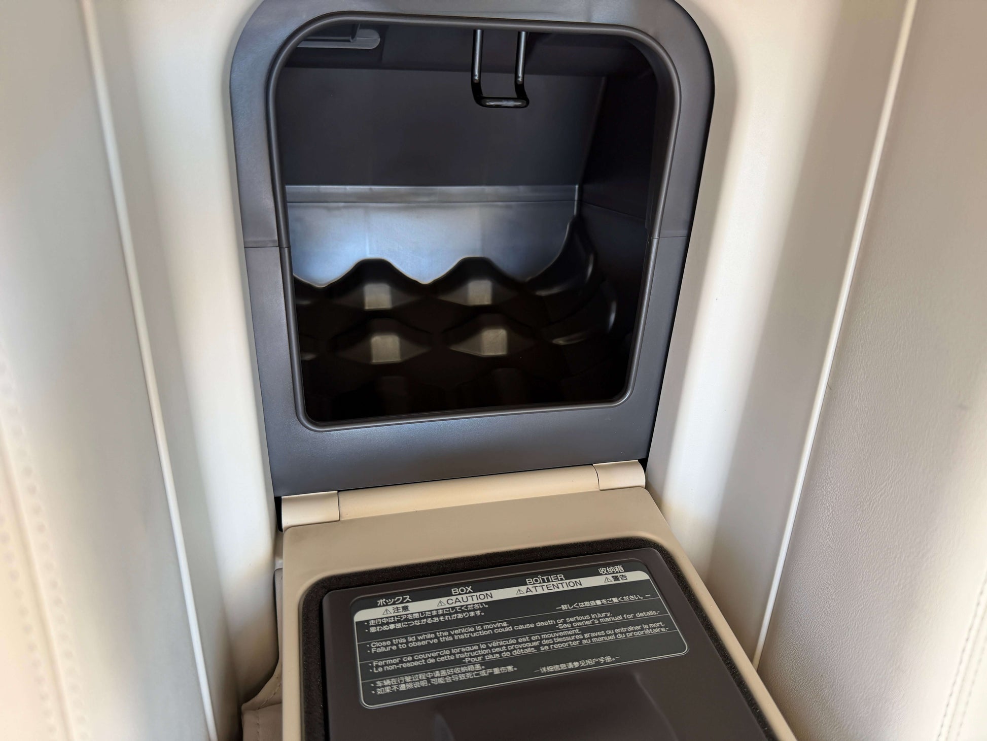 Interior view of the cupholder in a 2007 Lexus LS600h AWD V8 5.0L Hybrid, designed for luxury and convenience.