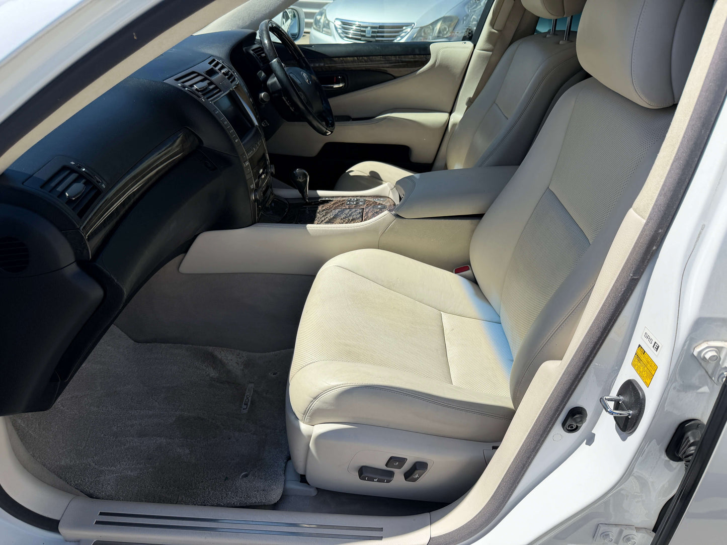 Interior view of 2007 Lexus LS600h AWD V8 5.0L Hybrid showing spacious and luxurious seating.