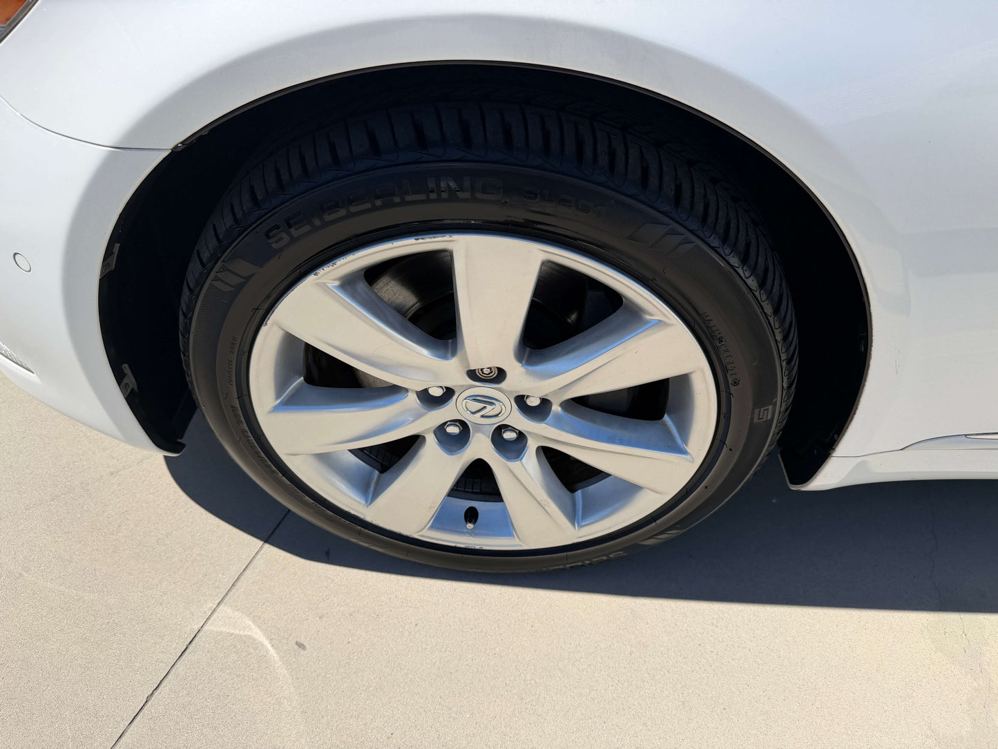 2007 Lexus LS600h AWD V8 5.0L Hybrid luxury sedan wheel close-up showcasing premium alloy rim and tire.