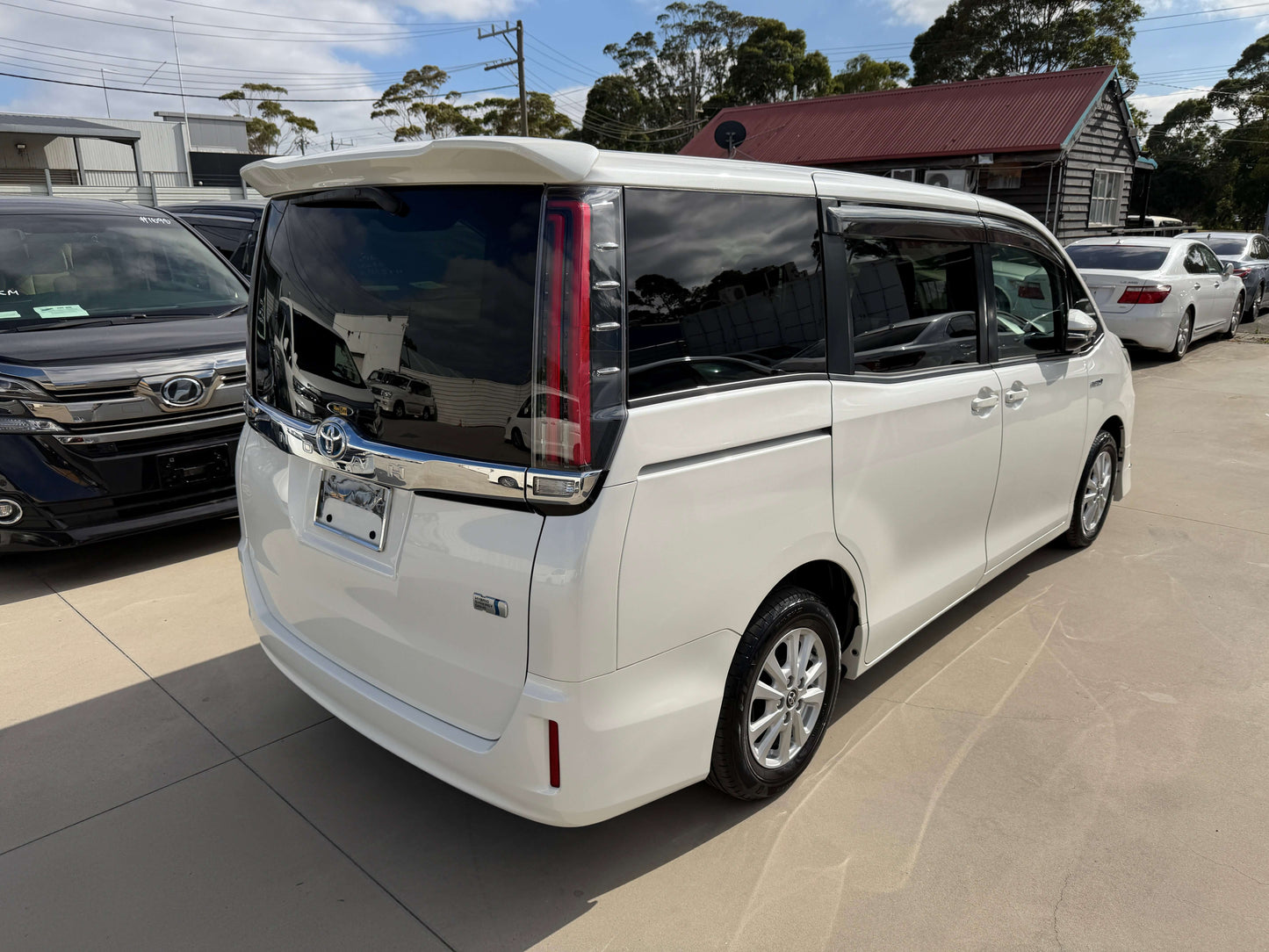 2018 Toyota Noah 1.8L Hybrid G Premium Edition rear view, showcasing sleek design and spacious 7-seater capacity.