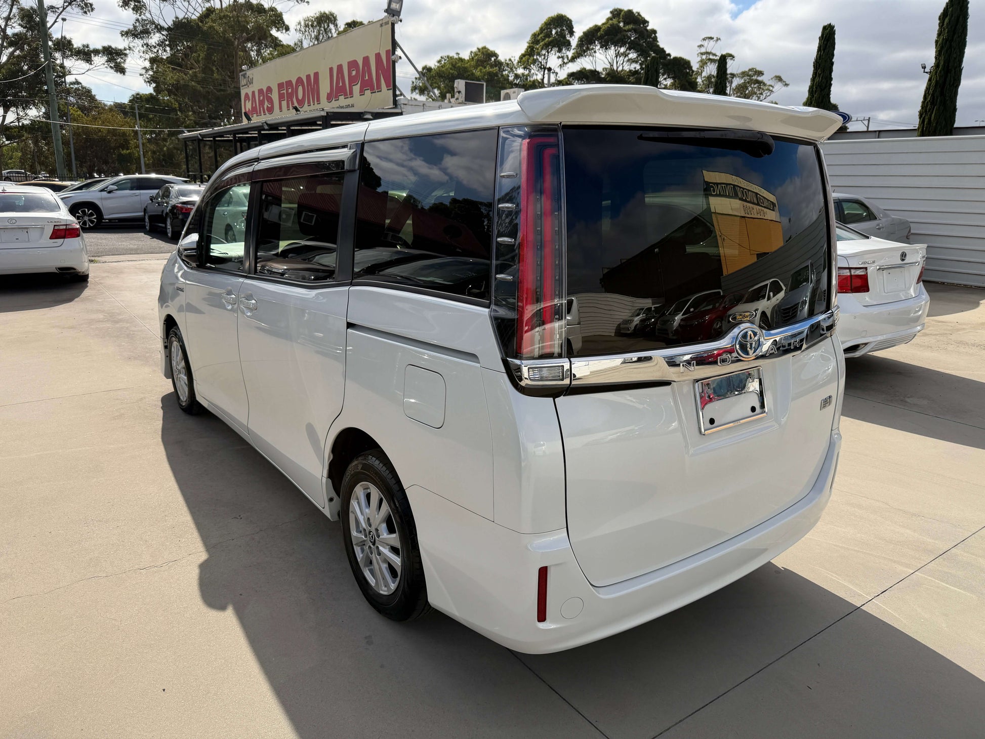2018 Toyota Noah 1.8L Hybrid G Premium Edition rear view, featuring sleek design and spacious interior.