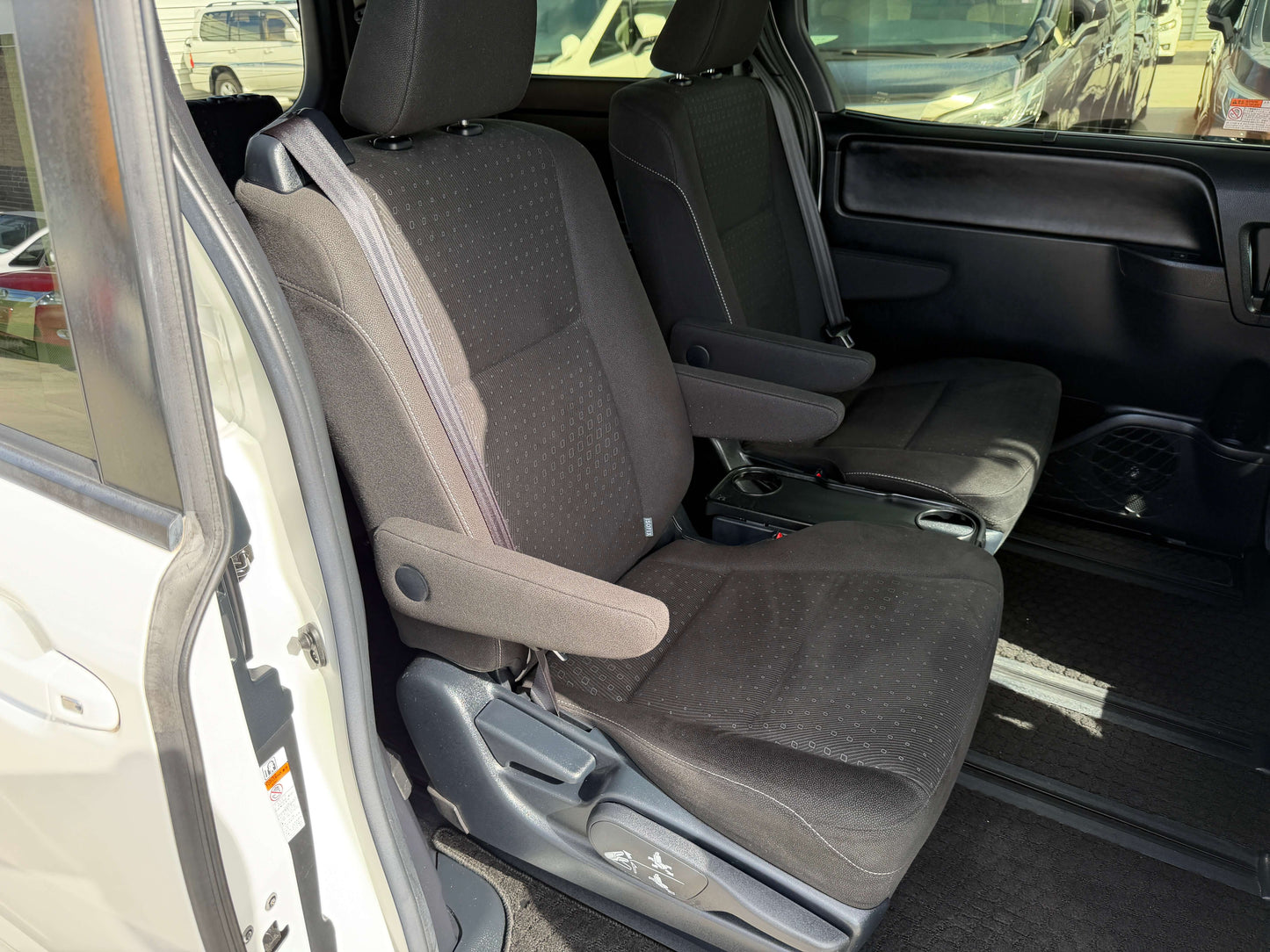 Interior view of 2018 Toyota Noah 1.8L Hybrid G Premium Edition showing front seats.