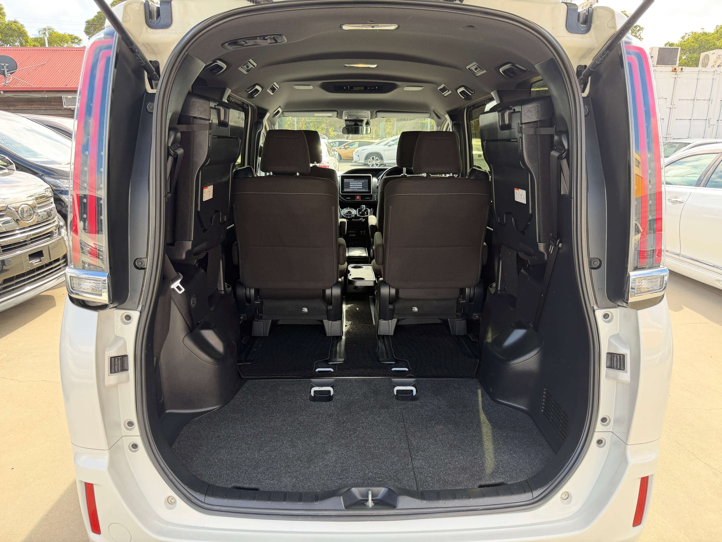 Back view of the spacious interior of a 2018 Toyota Noah 1.8L Hybrid G Premium Edition 7 seater.