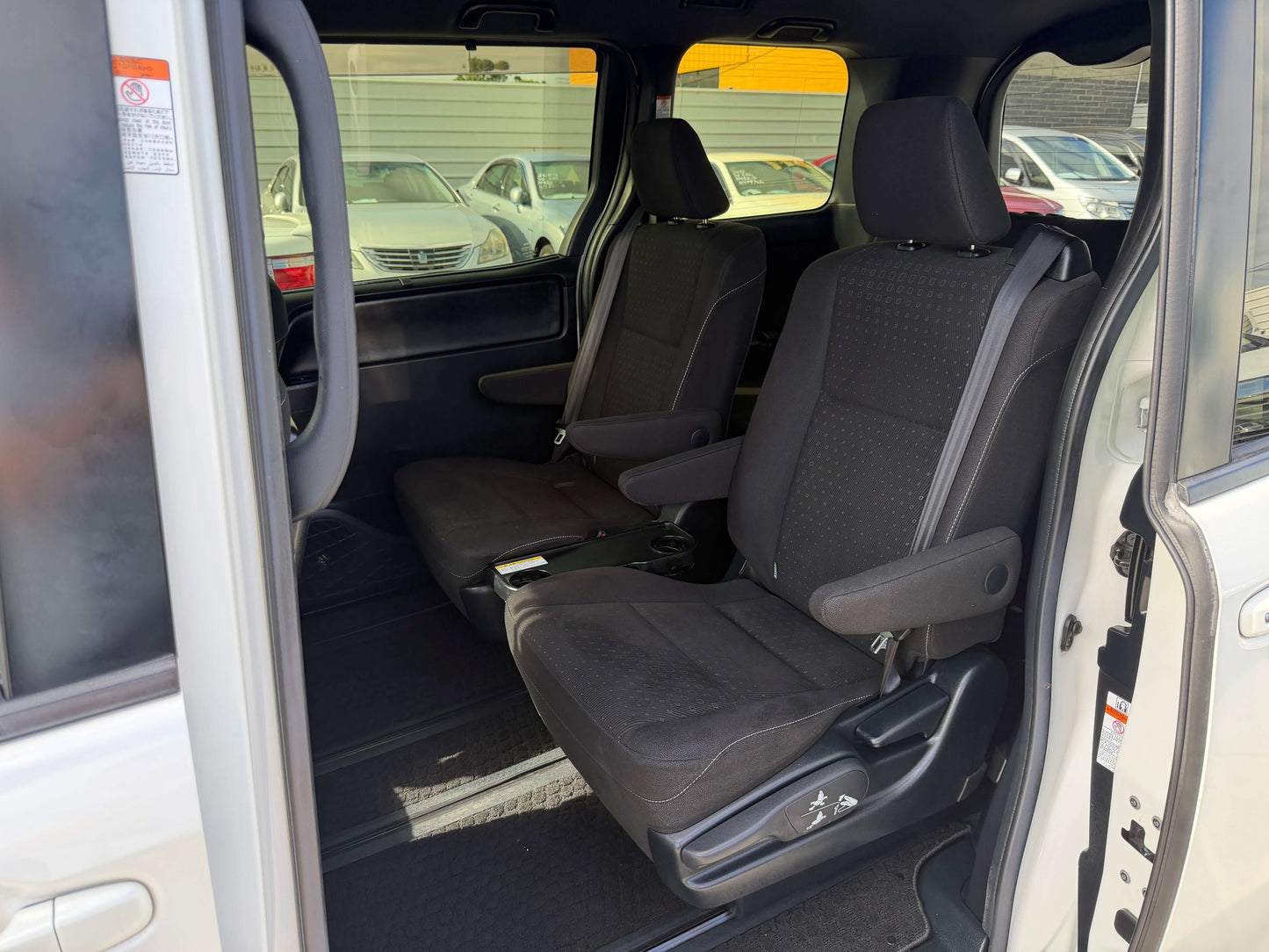 Interior view of 2018 Toyota Noah 1.8L Hybrid G Premium Edition 7 seater showing seats.