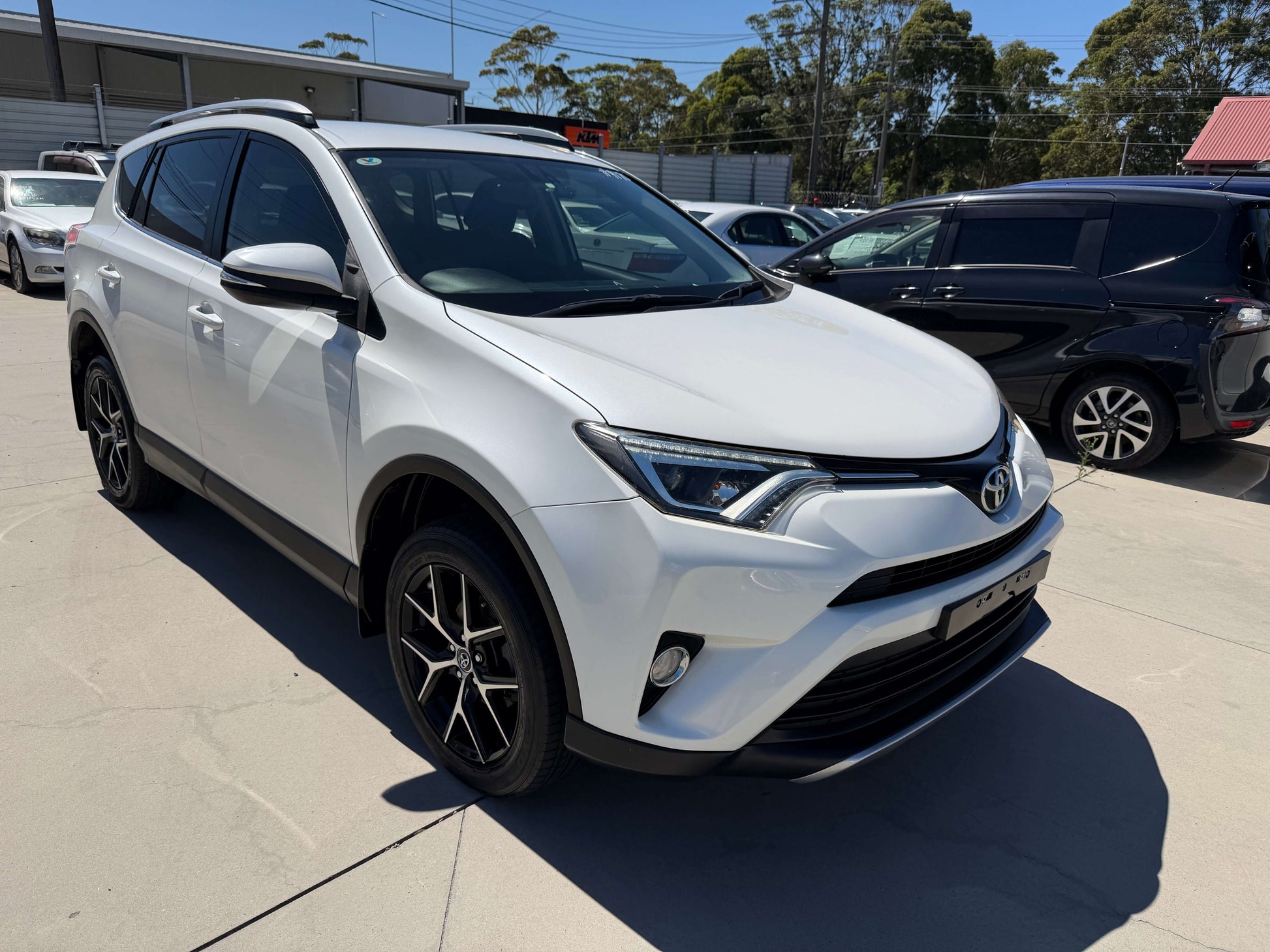 2016 Toyota RAV4 2.0L GX Wagon Auto parked on a lot, showcasing its sleek design and modern features.