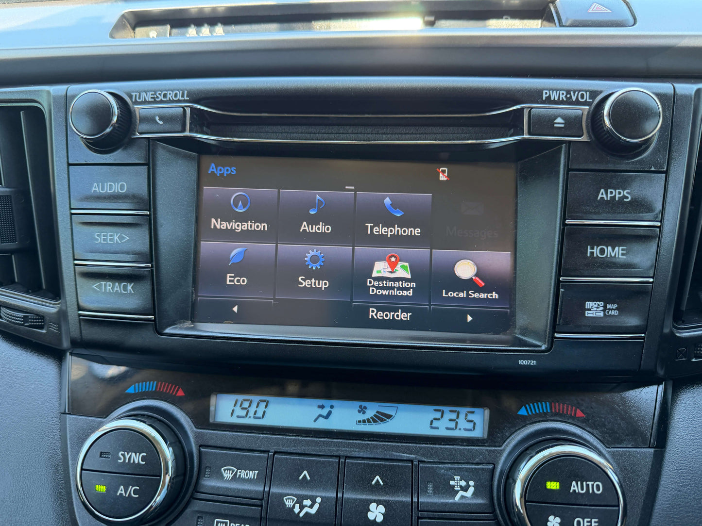 Dashboard infotainment system of 2016 Toyota RAV4 with navigation and audio controls.
