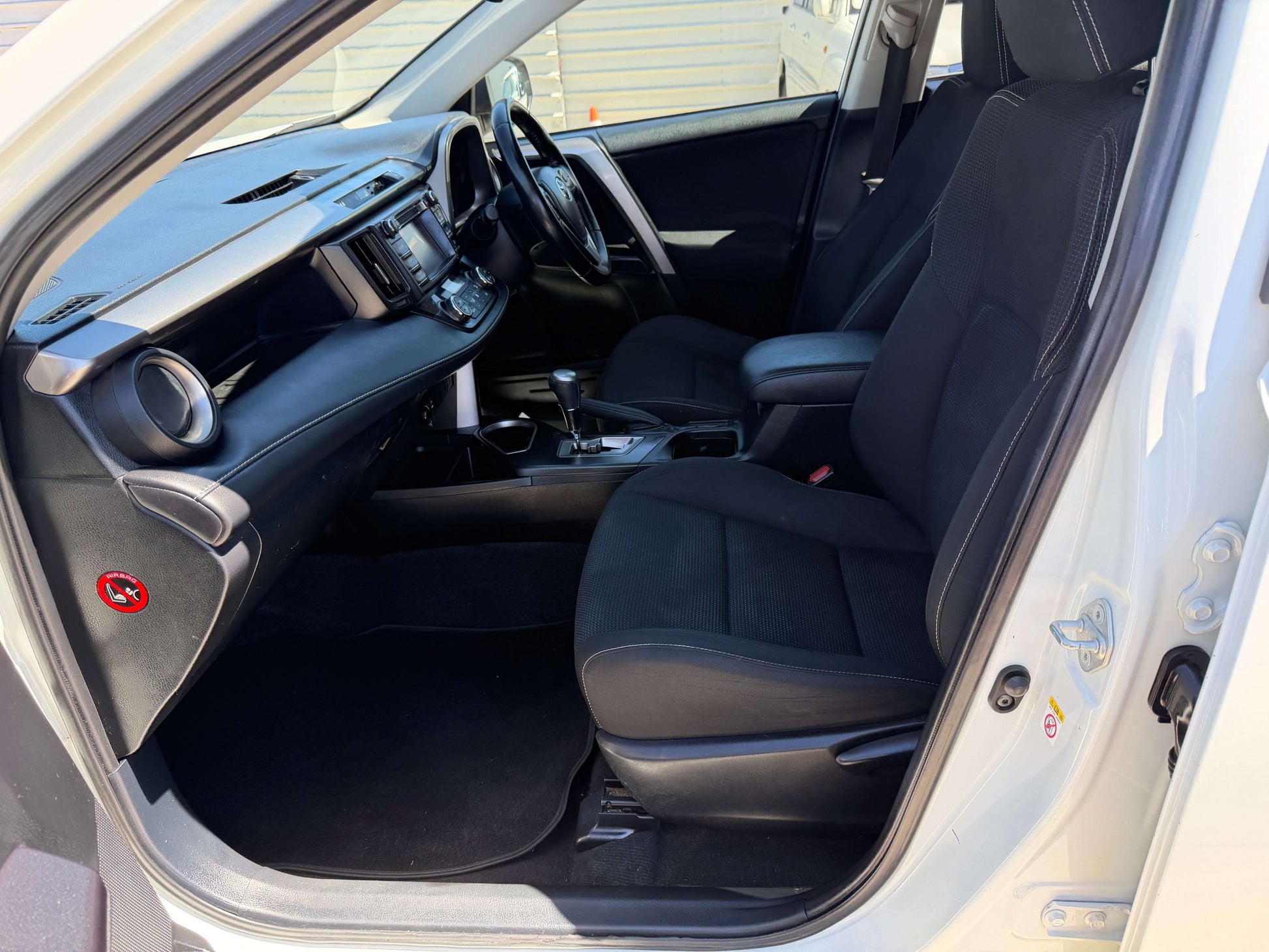 Interior view of a 2016 Toyota RAV4 2.0L GX Wagon Auto featuring comfortable seating and modern dashboard.