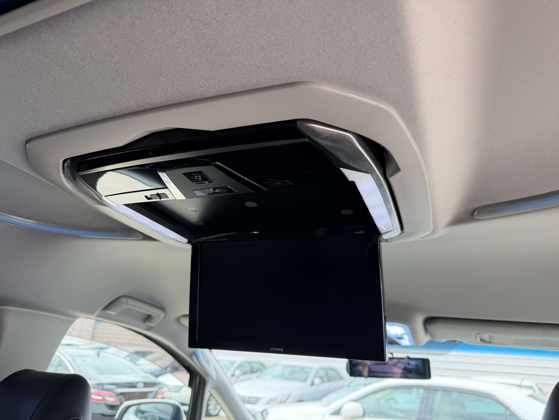 Roof-mounted DVD player in the 2016 Toyota Alphard 2.5L SA Package Luxury People Mover for entertainment.