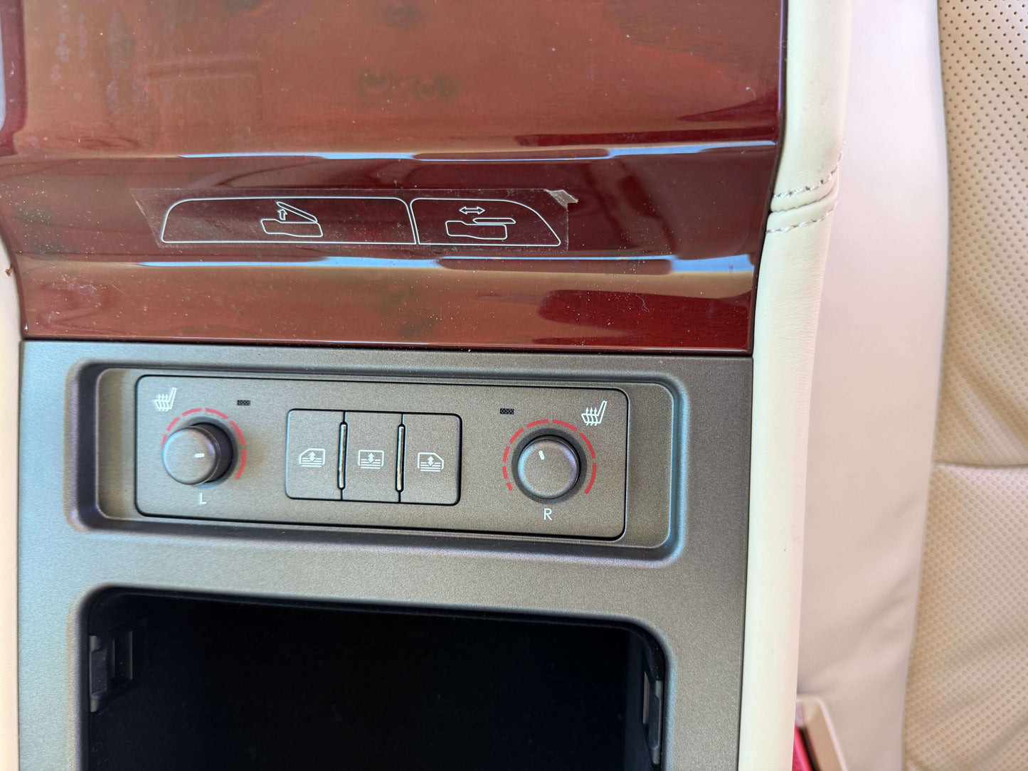 2010 Lexus LS460 AWD V8 4.6L interior image showing climate control and seat heating features.