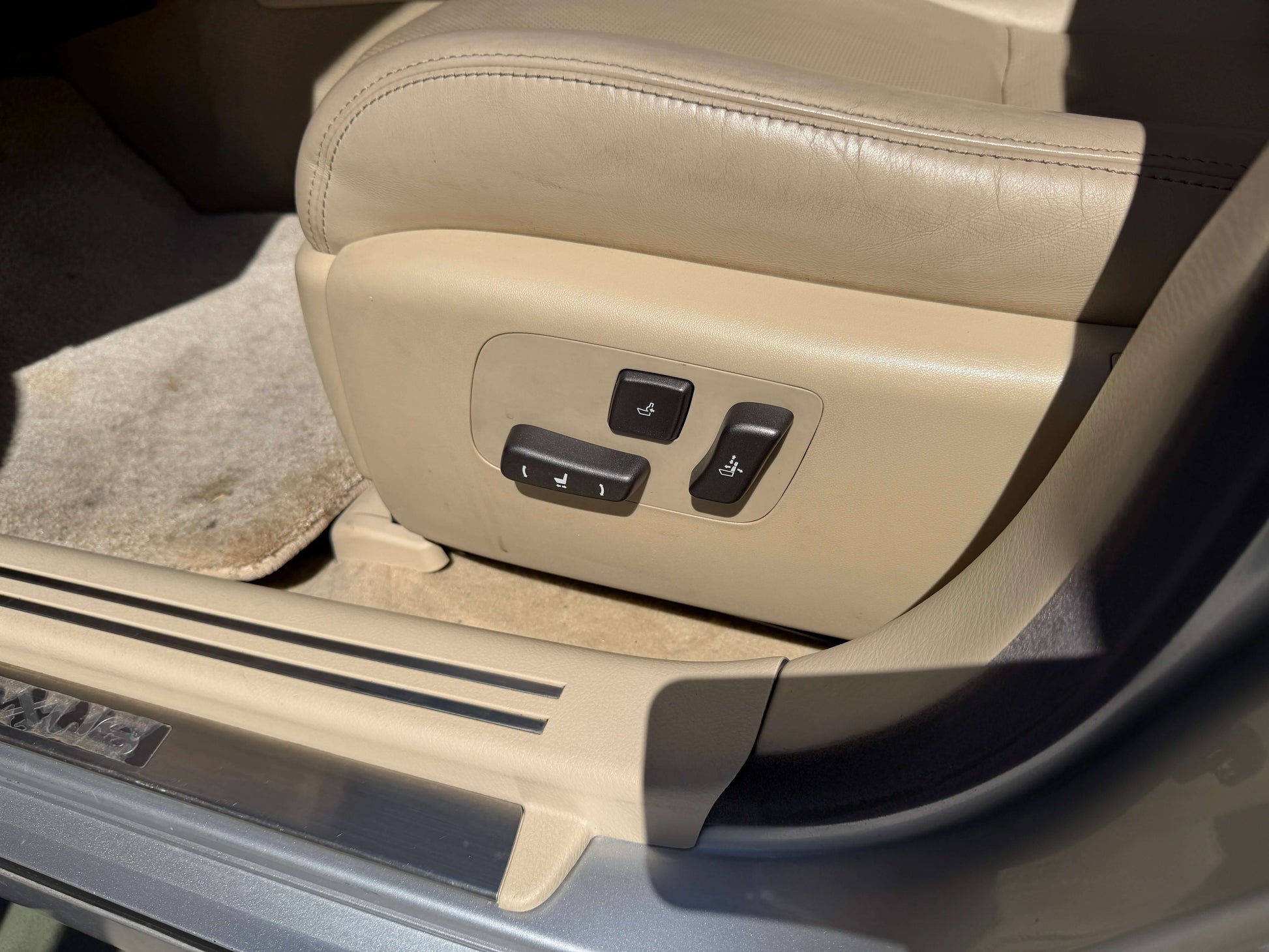 Power seat controls in the 2010 Lexus LS460 AWD V8 4.6L luxury sedan interior.