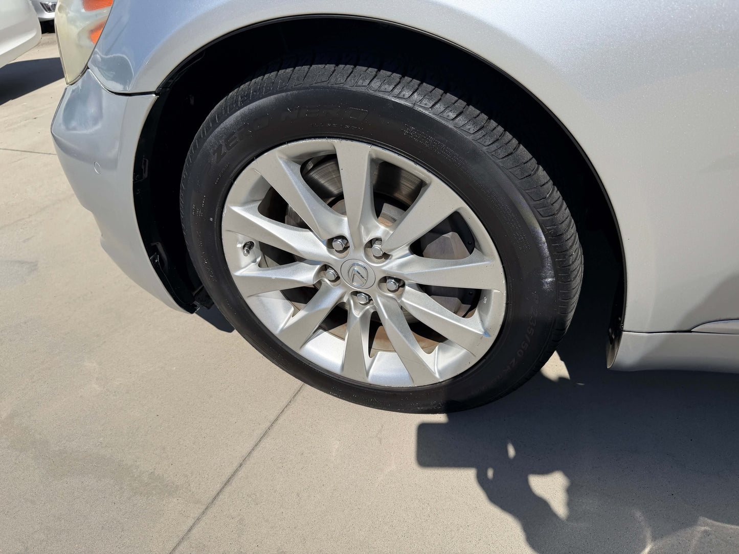 2010 Lexus LS460 AWD V8 4.6L silver sedan wheel and tire close-up view