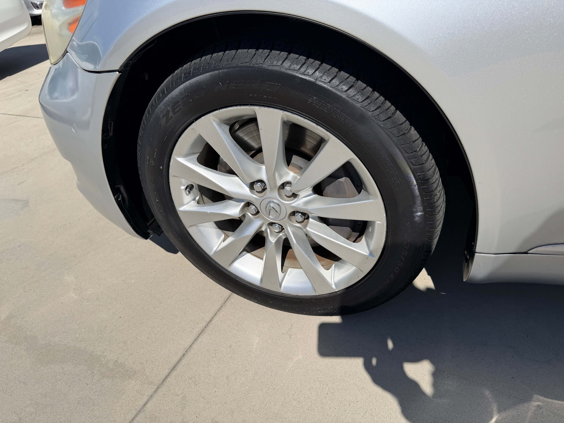 2010 Lexus LS460 AWD V8 4.6L silver sedan wheel and tire close-up view