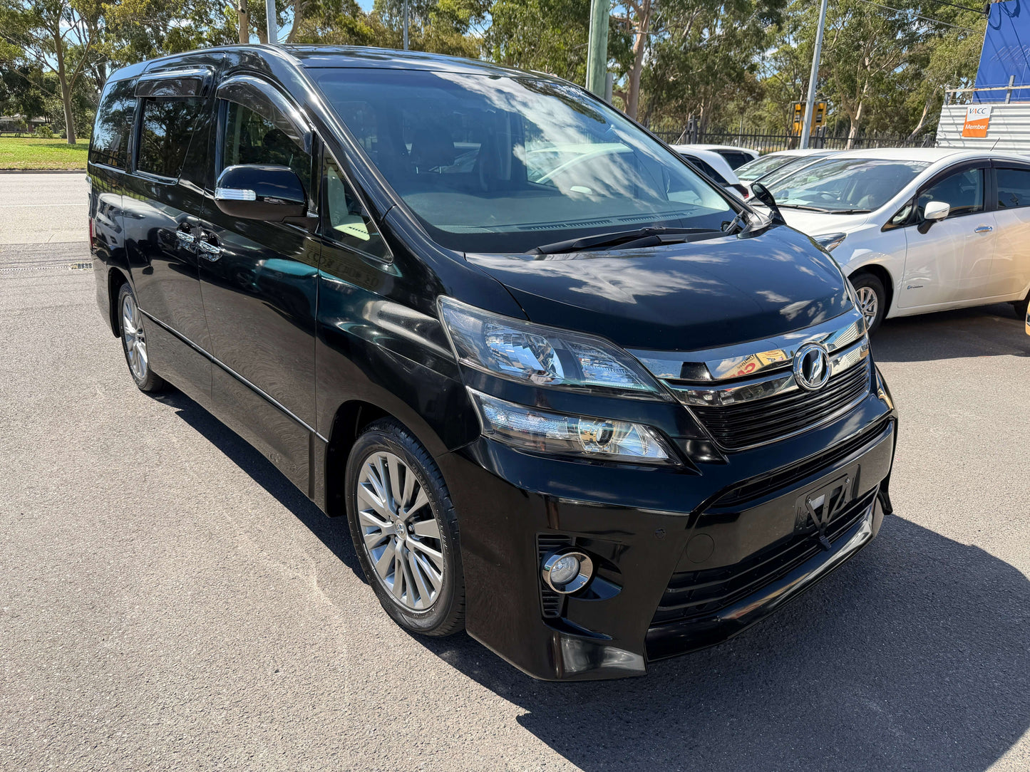 2013 Toyota Vellfire 2.4L Z Golden Eyes Edition in black, showcasing sleek design and spacious 7-seat configuration.