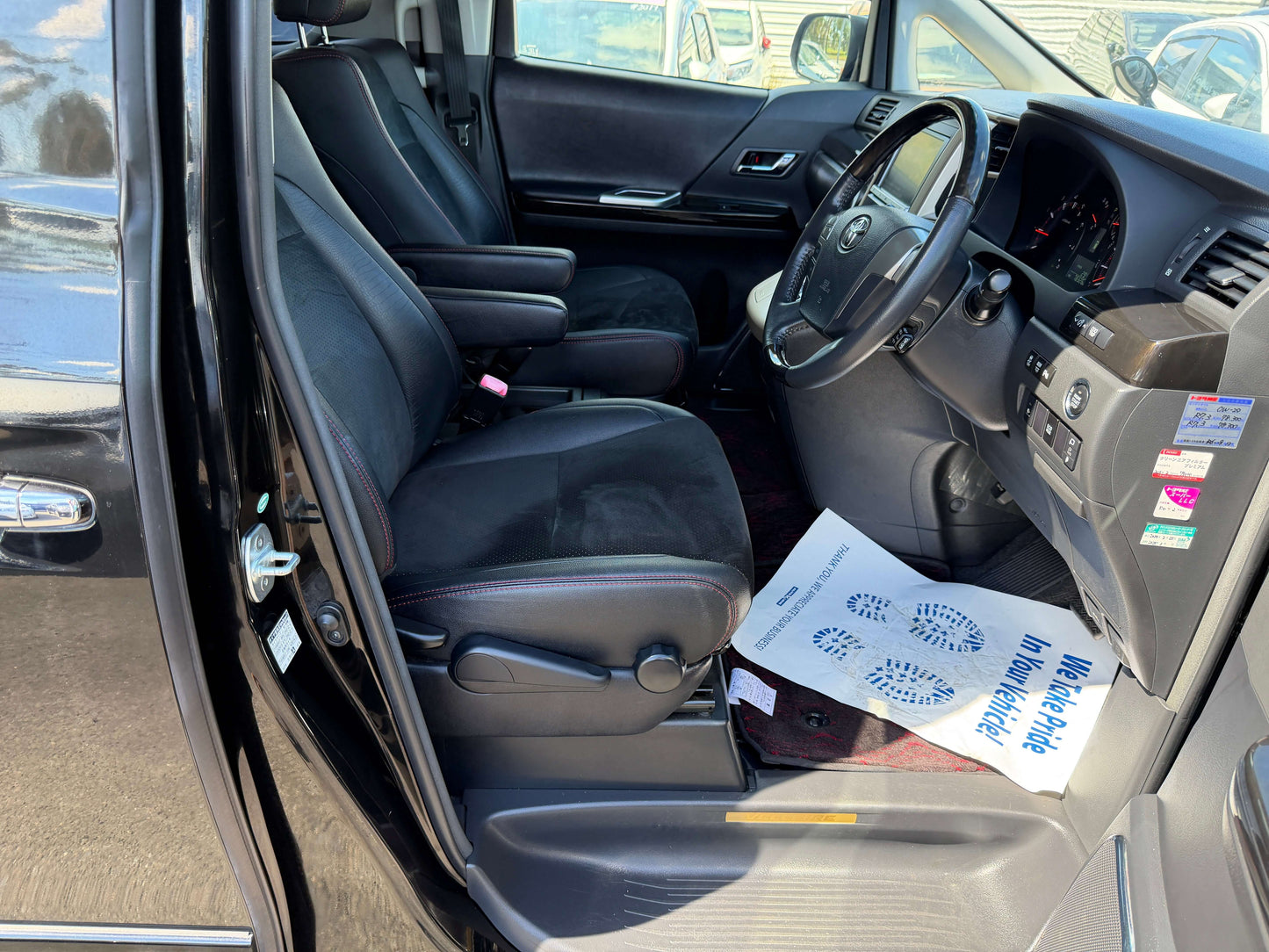 Interior view of 2013 Toyota Vellfire 2.4L Z Golden Eyes Edition showing the driver's side seating.