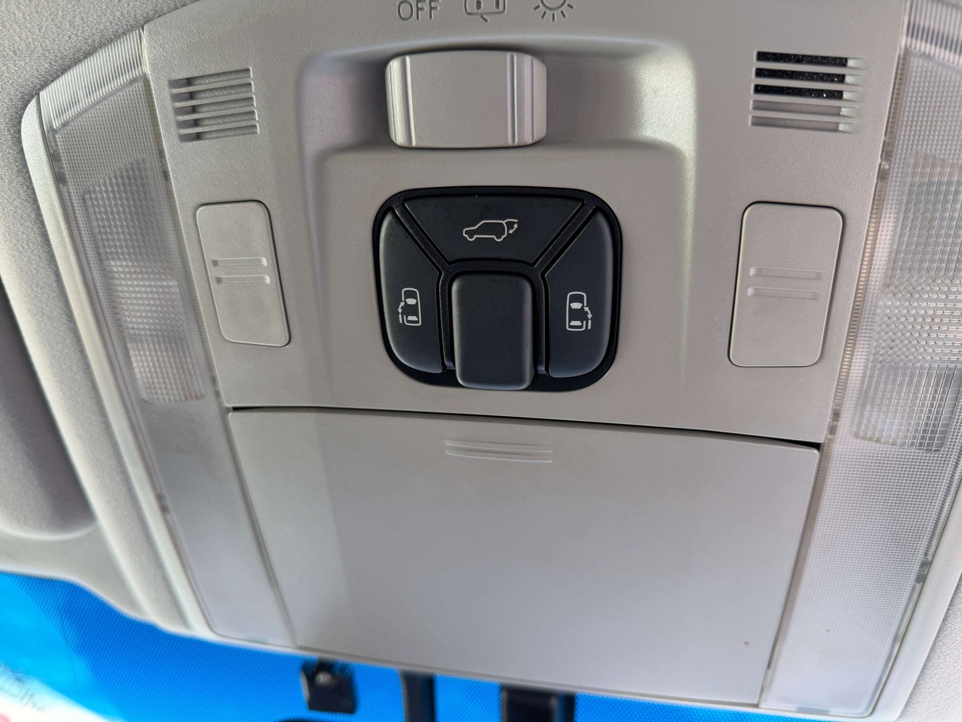 Interior overhead console controls of 2013 Toyota Vellfire 2.4L, featuring lights and lock buttons.