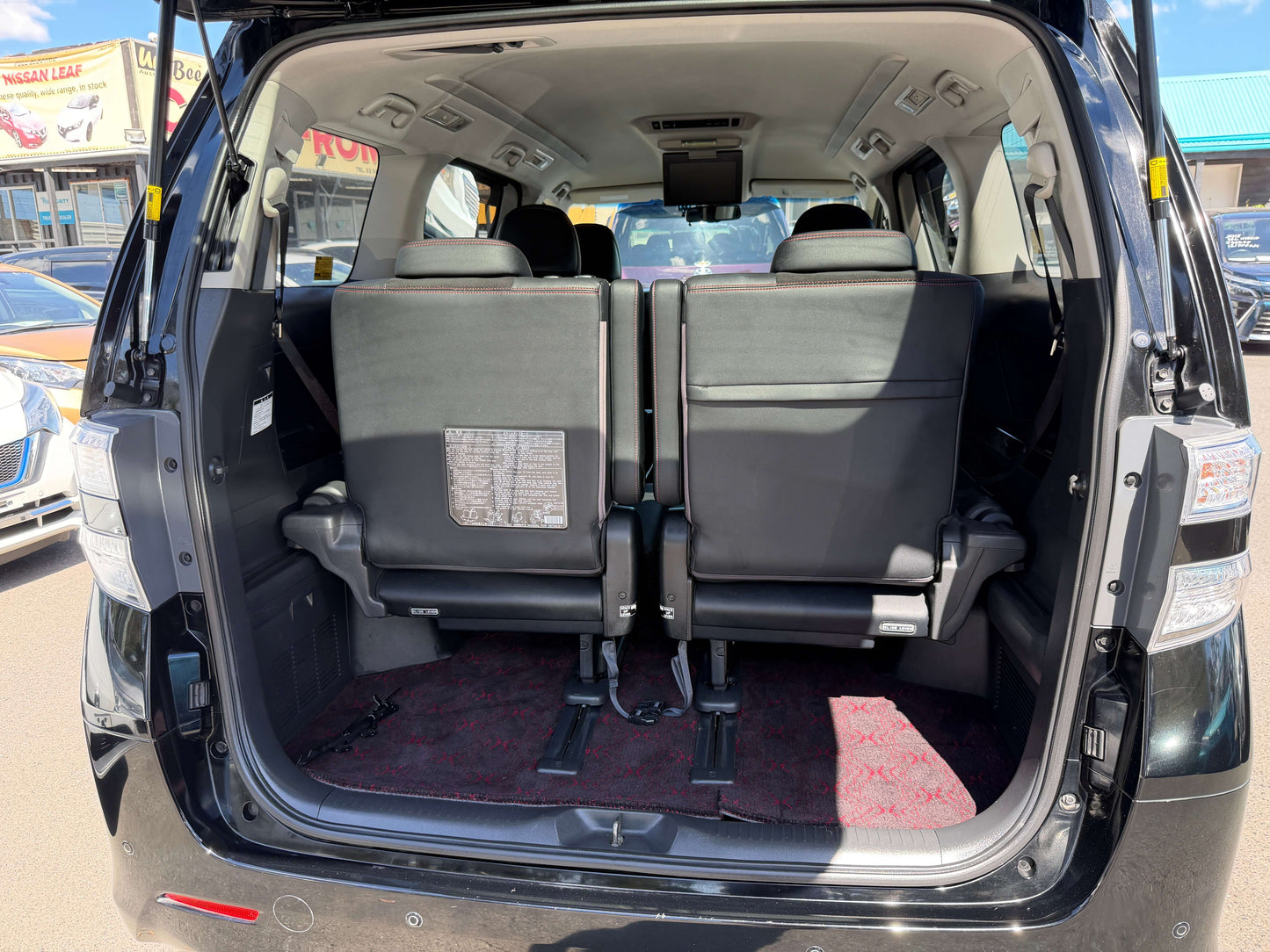2013 Toyota Vellfire 2.4L Z Golden Eyes Edition 7 seats interior view showing rear seating arrangement and cargo area.