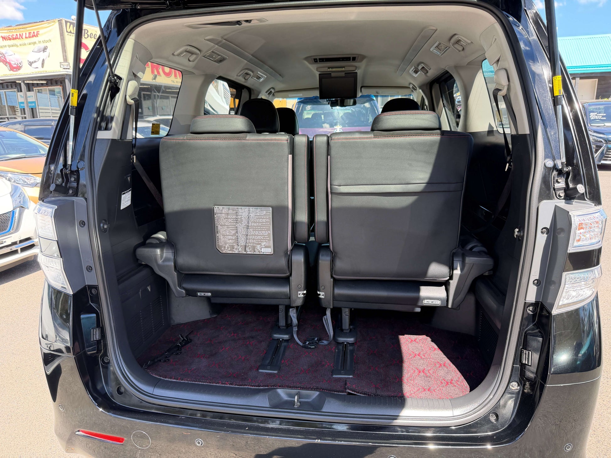 2013 Toyota Vellfire 2.4L Z Golden Eyes Edition 7 seats interior view showing rear seating arrangement and cargo area.