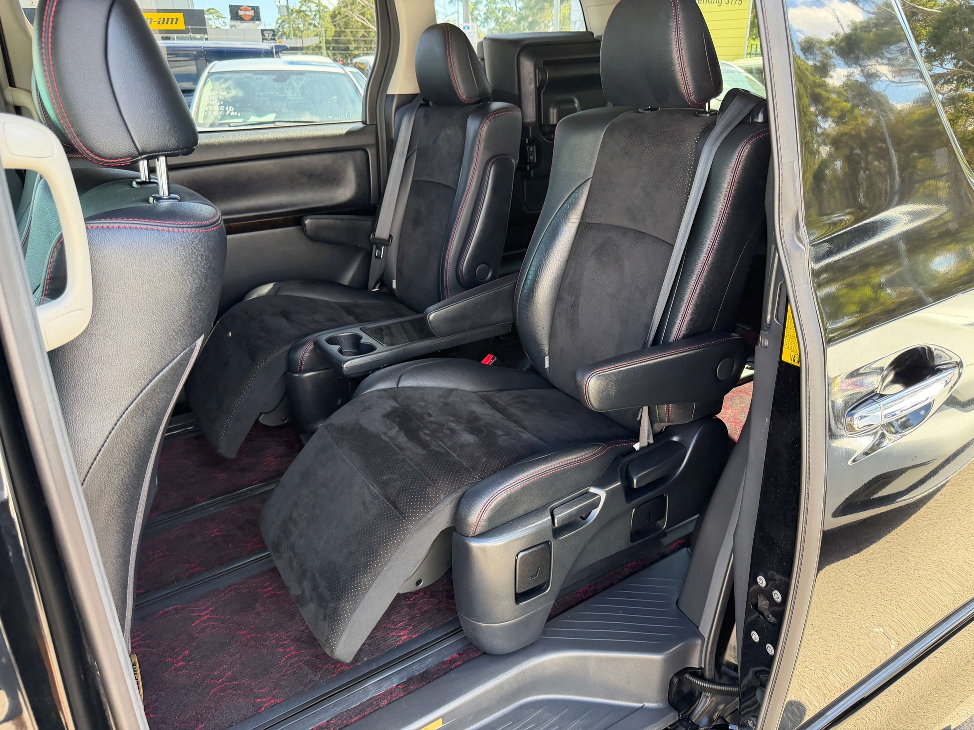 Interior view of a 2013 Toyota Vellfire 2.4L Z Golden Eyes Edition showing 7 seats and spacious layout.