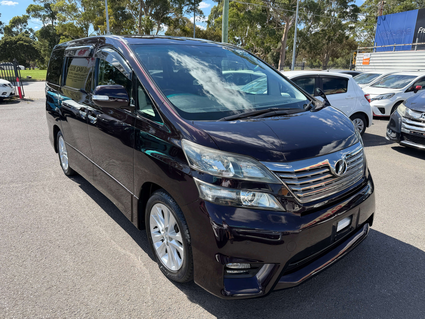 2009 Toyota Vellfire 2.4L Z Edition luxury people mover in black parked outdoors.