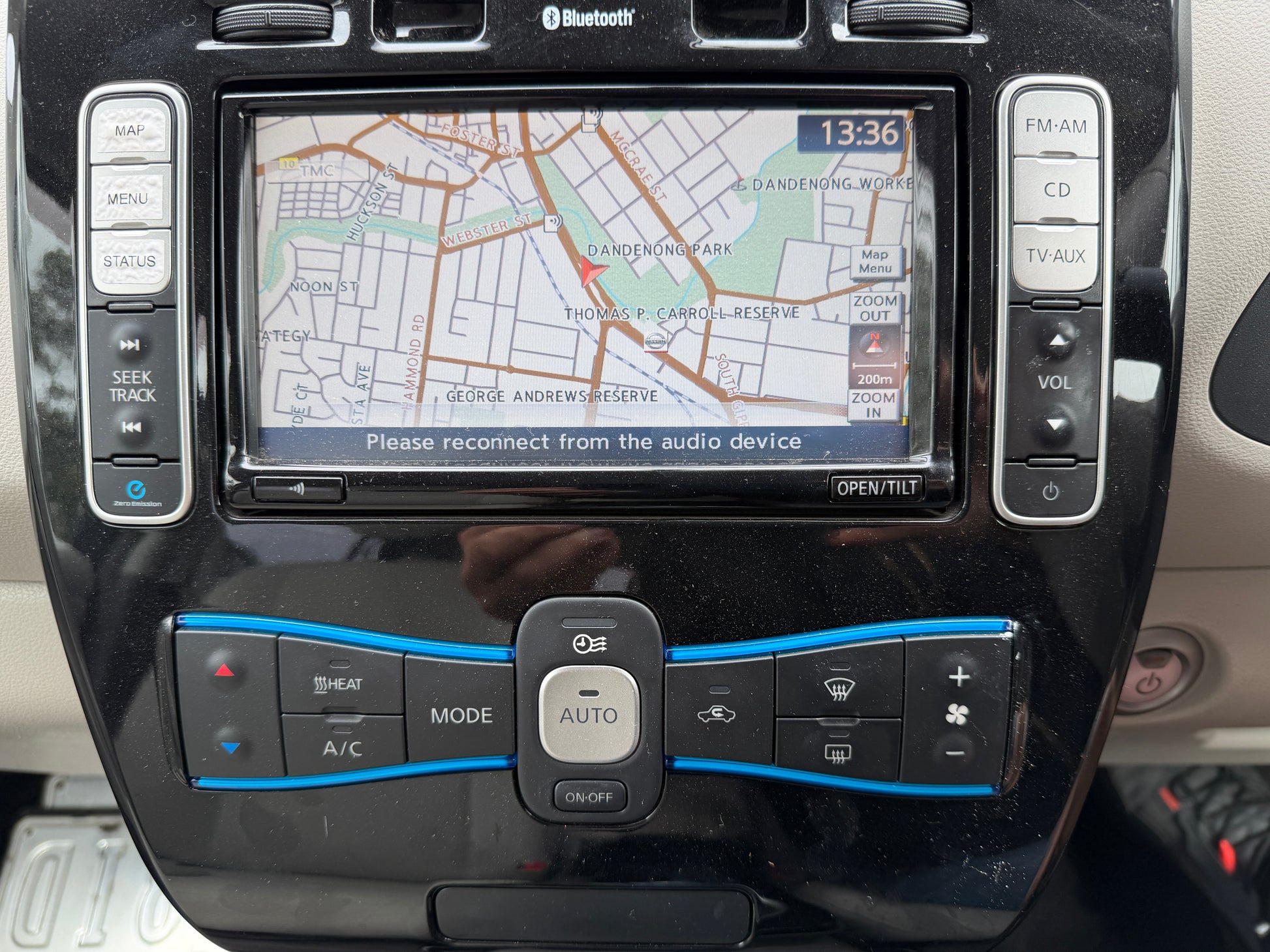 2015 Nissan Leaf 24kW G-Edition Full Electric dashboard showing navigation and control panel.