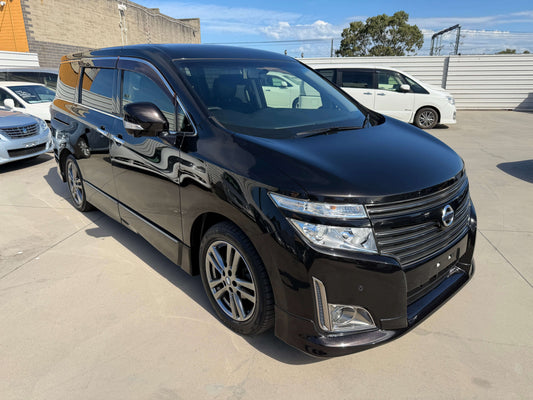 2012 Nissan Elgrand 2.5L 250 Highway Star black luxury people mover on display.