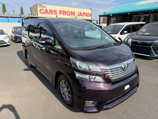 2009 Toyota Vellfire 2.4L Z Edition luxury people mover for sale with 8 seats available, featuring distinct purple exterior.