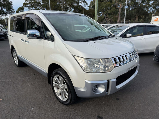 2011 Mitsubishi Delica D5 2.4 4WD Chamonix Edition in silver color, showing front and side view, ideal for families with 8 seats.