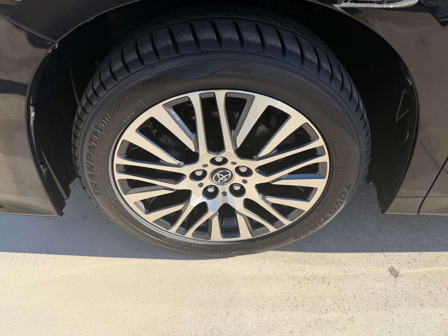 Close-up view of a stylish alloy wheel with a tire on a 2016 Toyota Vellfire V6 3.5L.