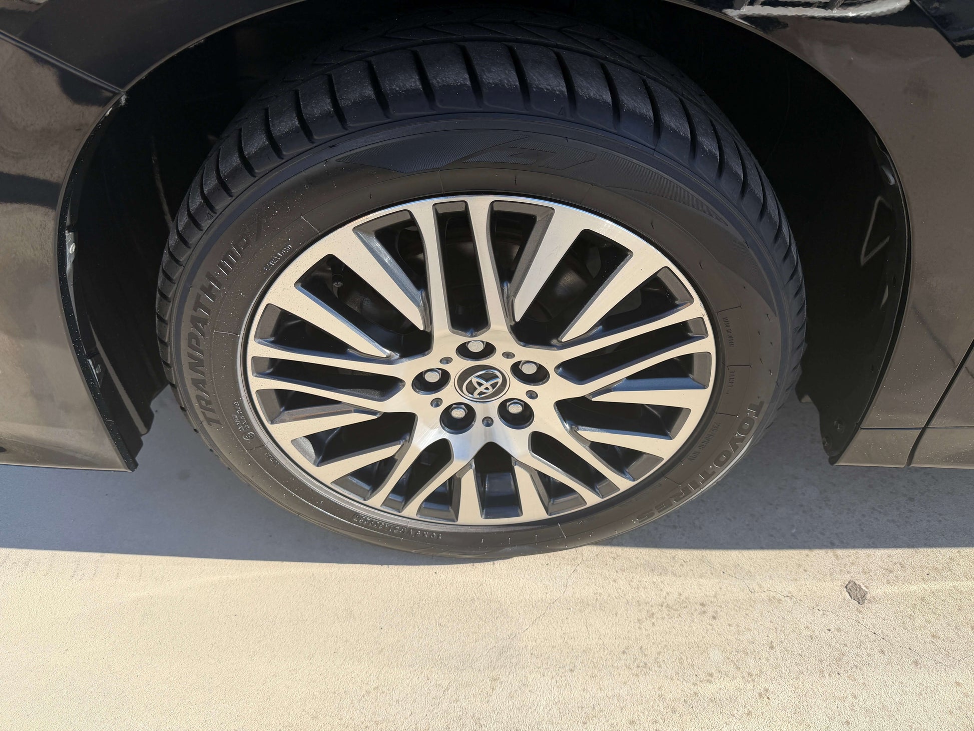 Close-up view of a stylish alloy wheel with a tire on a 2016 Toyota Vellfire V6 3.5L.