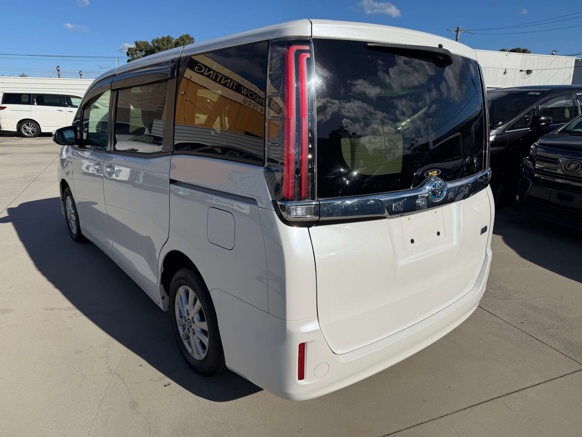 2017 Toyota Noah 1.8L Hybrid rear view showcasing sleek design and spacious interior