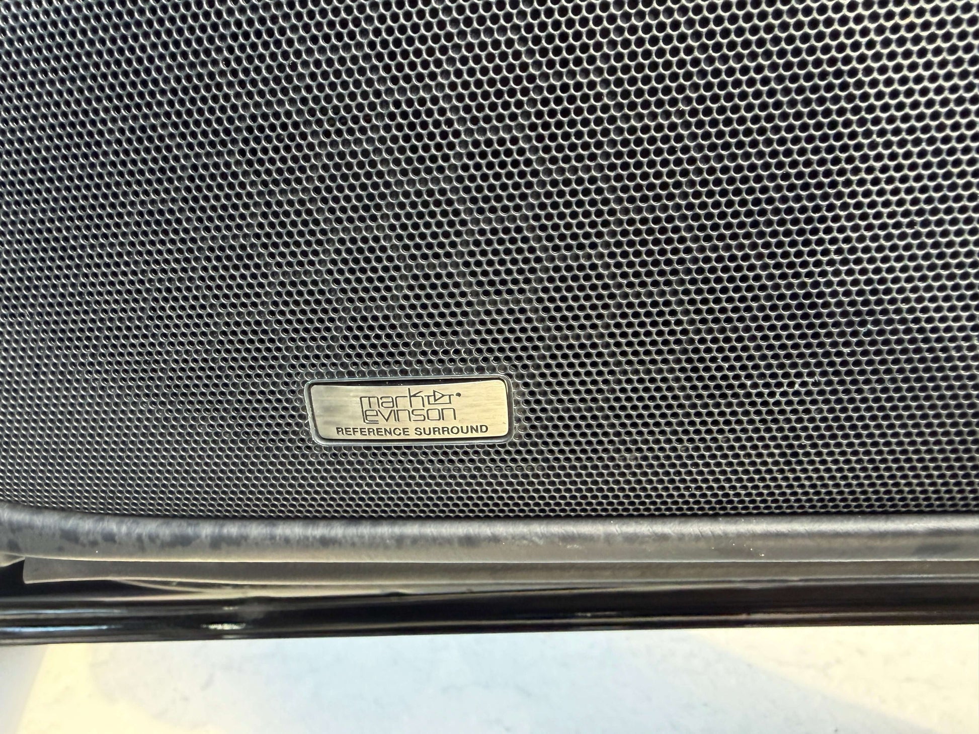 2007 Lexus LS600hL AWD V8 5.0L Hybrid Close-up of a speaker grill featuring the Mark Levinson Reference Surround label.