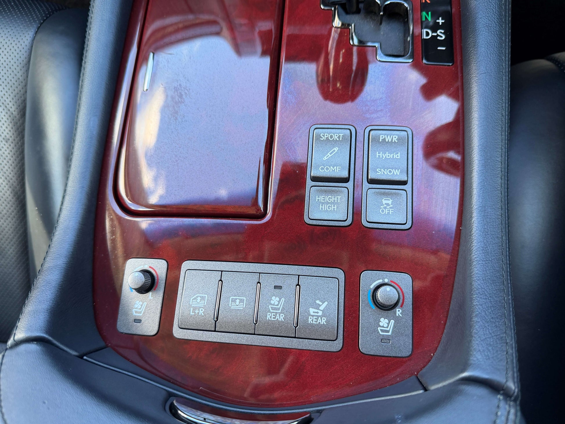 2007 Lexus LS600hL AWD V8 5.0L Hybrid console with controls and buttons for sport, hybrid, and rear features