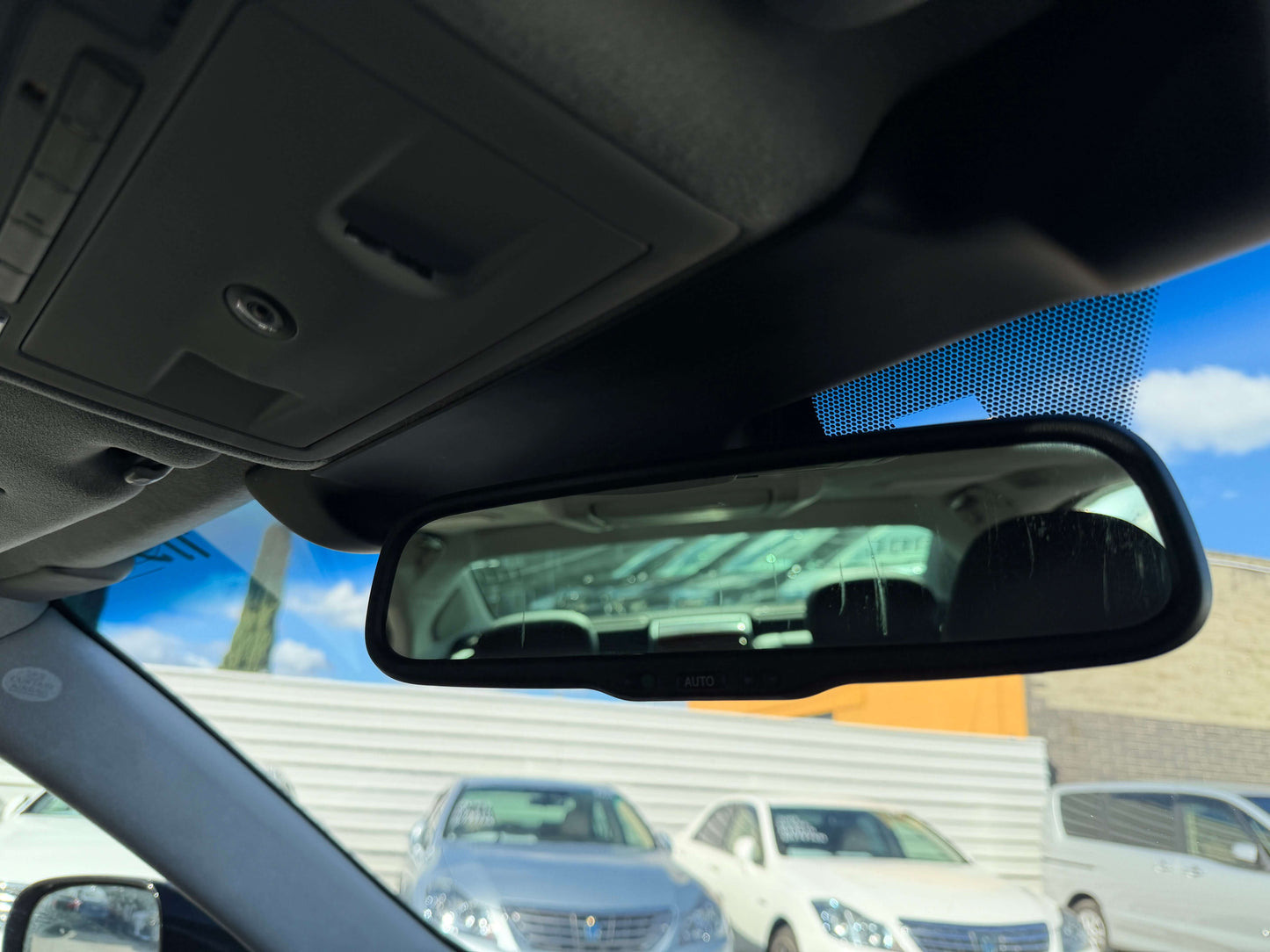 Interior view of 2007 Lexus LS600hL AWD V8 5.0L Hybrid with rearview mirror visible.