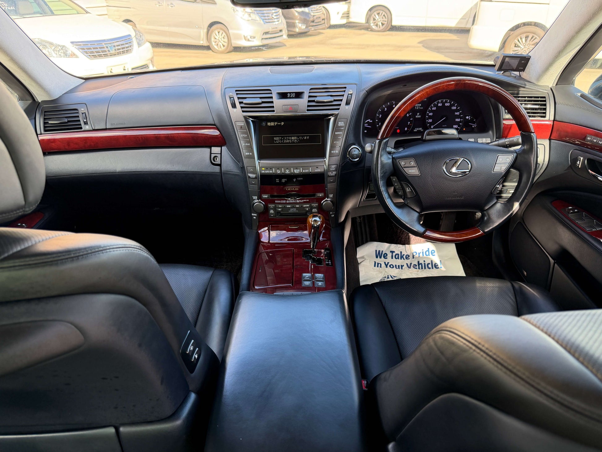 Interior view of a 2007 Lexus LS600hL AWD V8 5.0L Hybrid showcasing luxury features and leather seating.