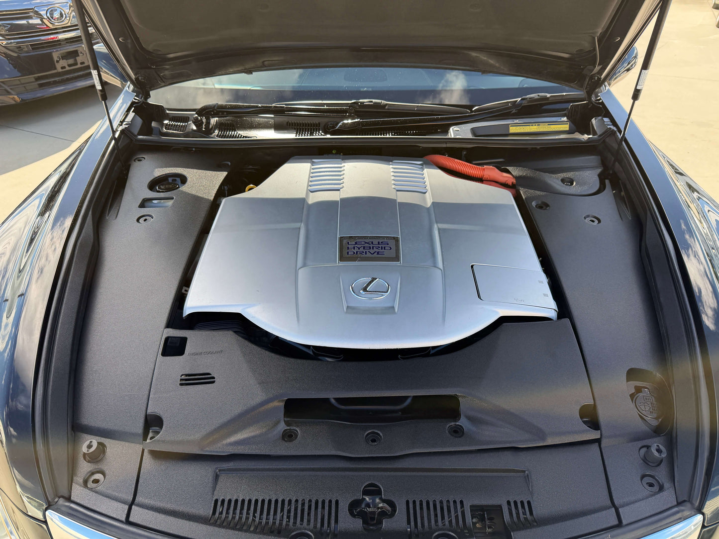 Engine view of 2007 Lexus LS600hL AWD V8 5.0L Hybrid, showcasing its hybrid powertrain.