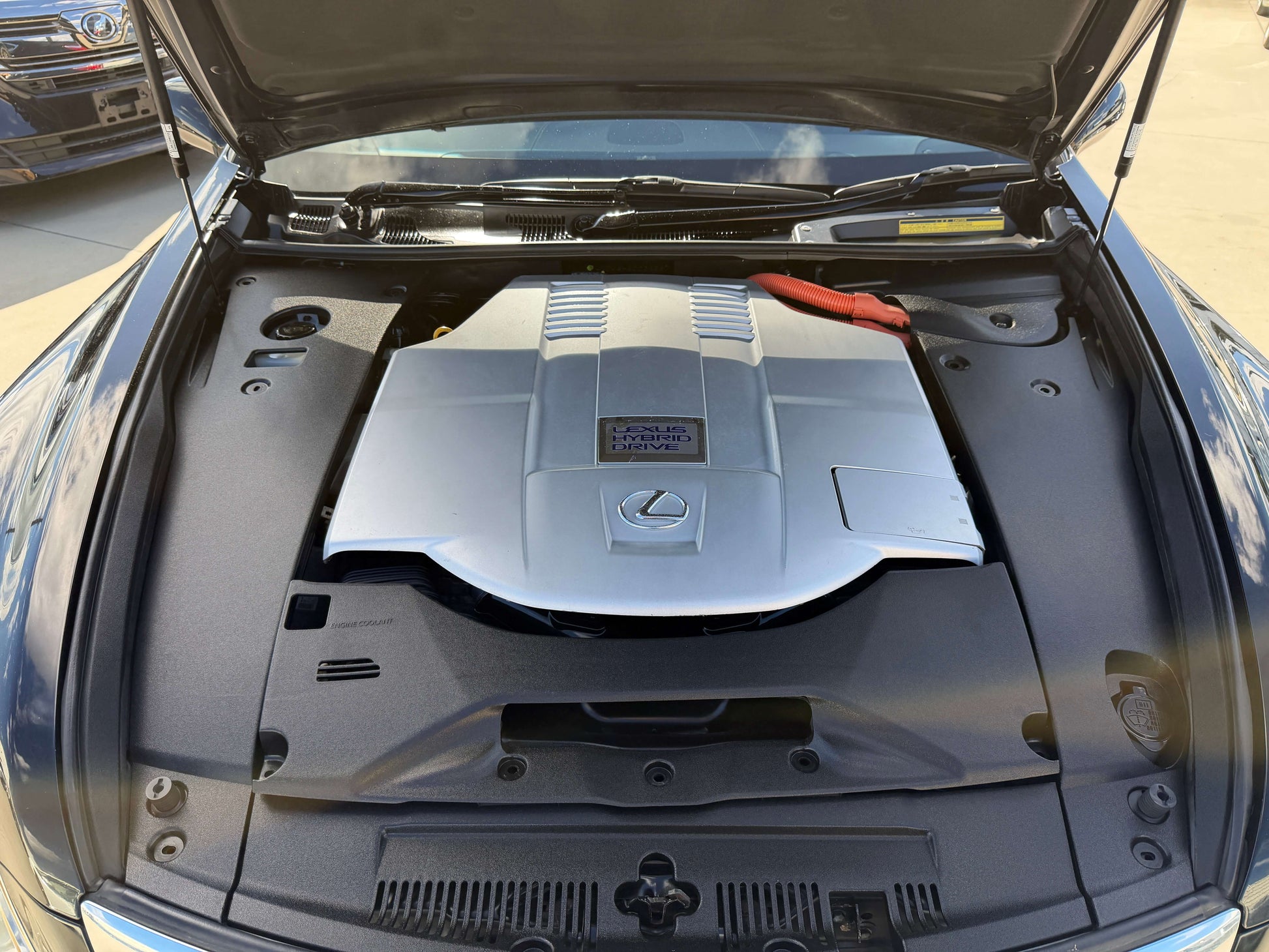 Engine view of 2007 Lexus LS600hL AWD V8 5.0L Hybrid, showcasing its hybrid powertrain.