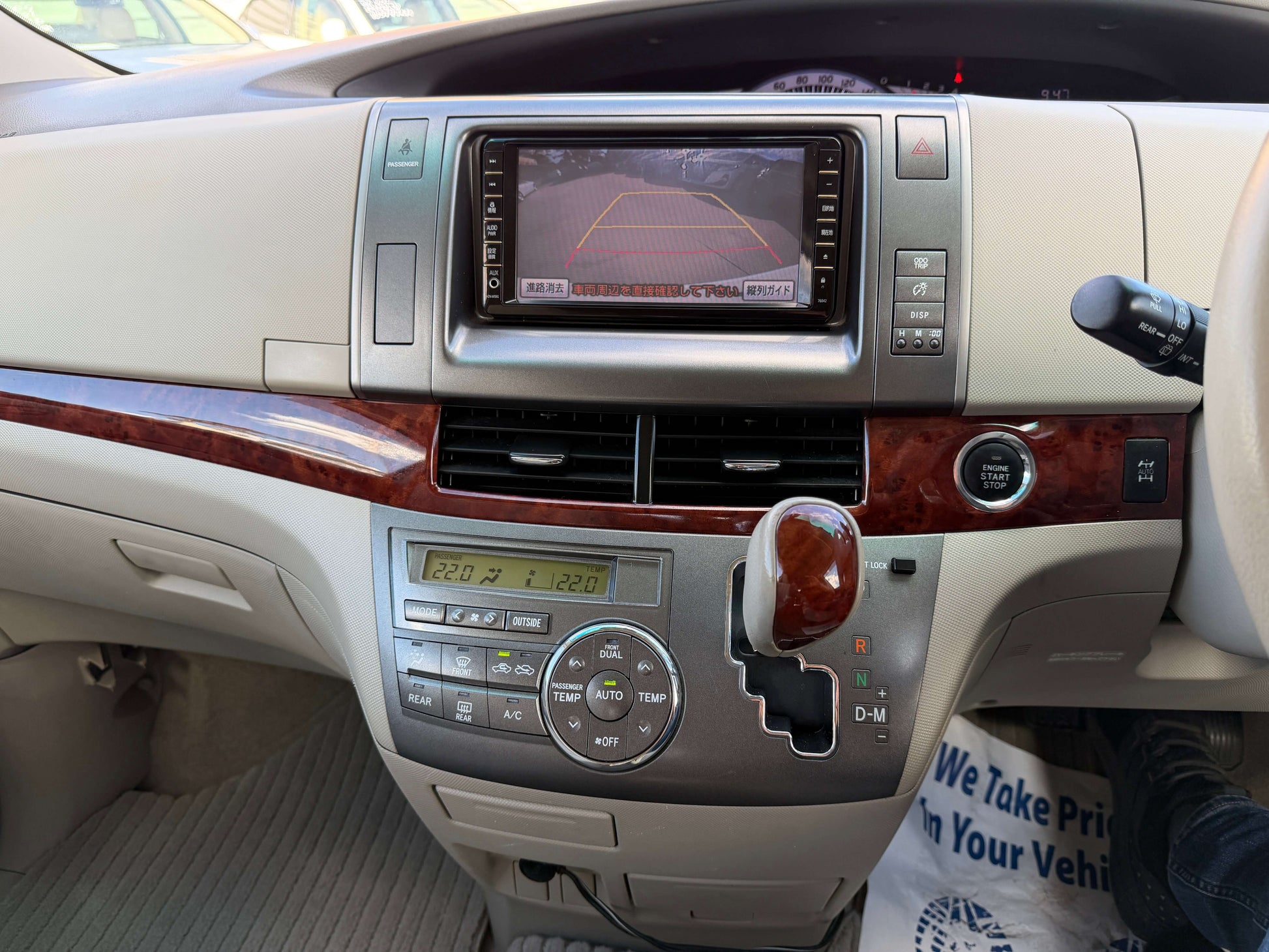 Interior dashboard of 2010 Toyota Estima 2.4L 4WD showing navigation and control features.