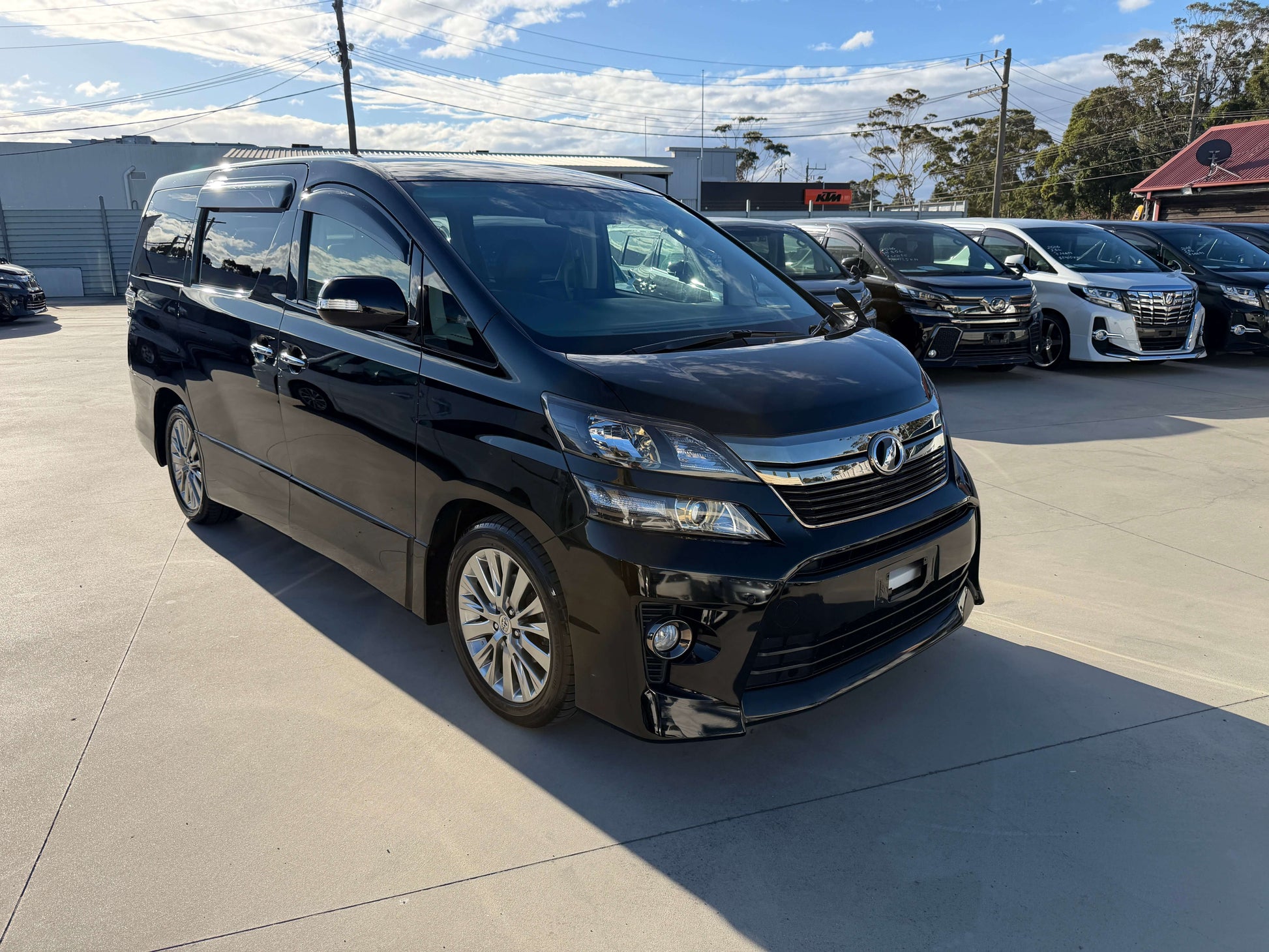 2014 Toyota Vellfire 2.4L Z Golden Eyes II Edition in black, showcasing exterior features.