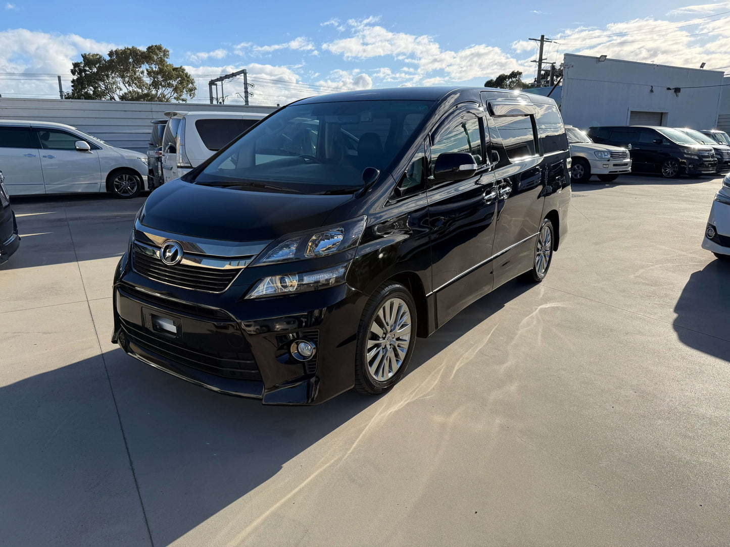 2014 Toyota Vellfire 2.4L Z Golden Eyes II Edition black minivan with 7 seats parked outdoors