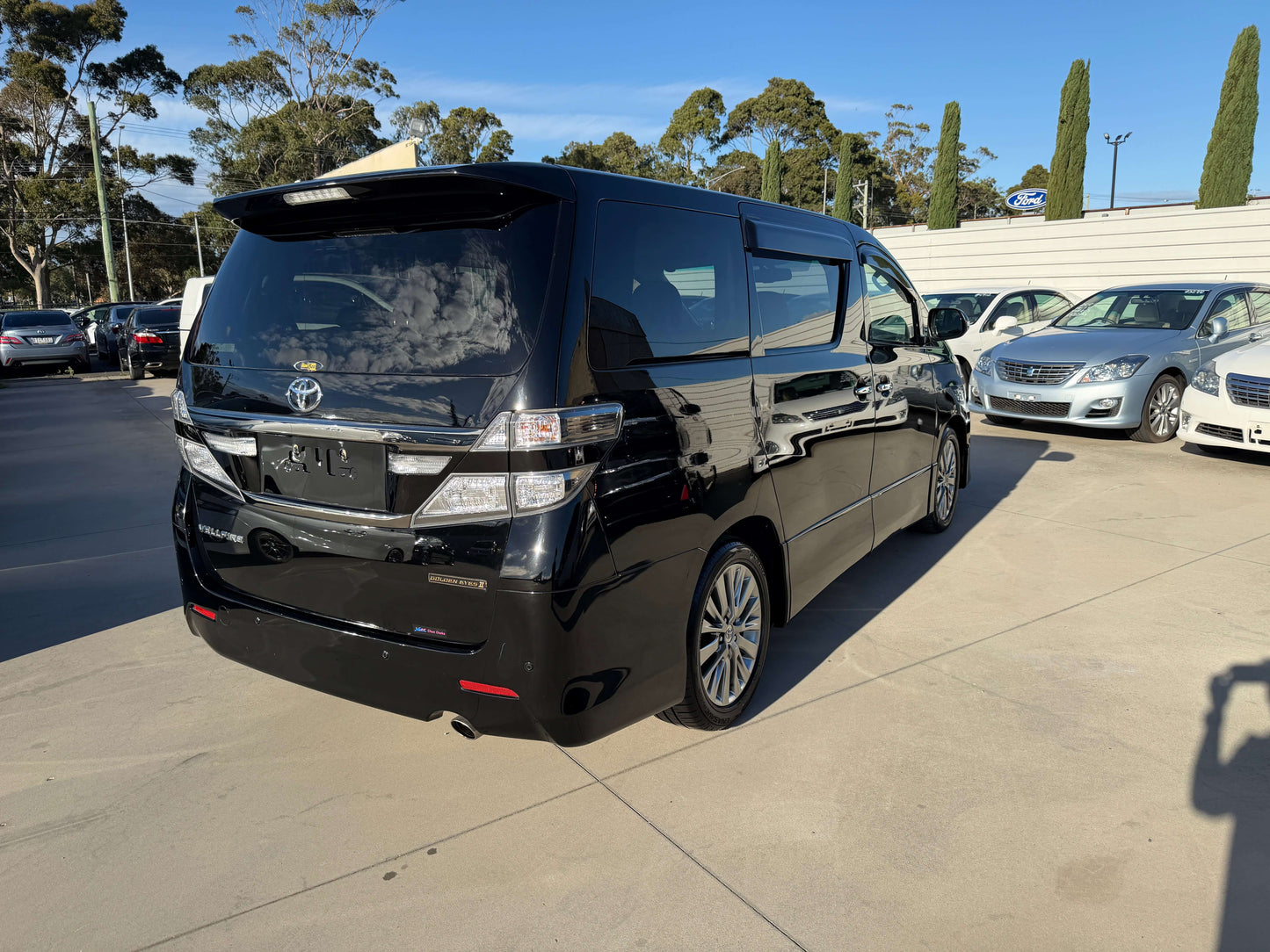 2014 Toyota Vellfire 2.4L Z Golden Eyes II Edition in black, showcasing rear view with spacious design and modern features.