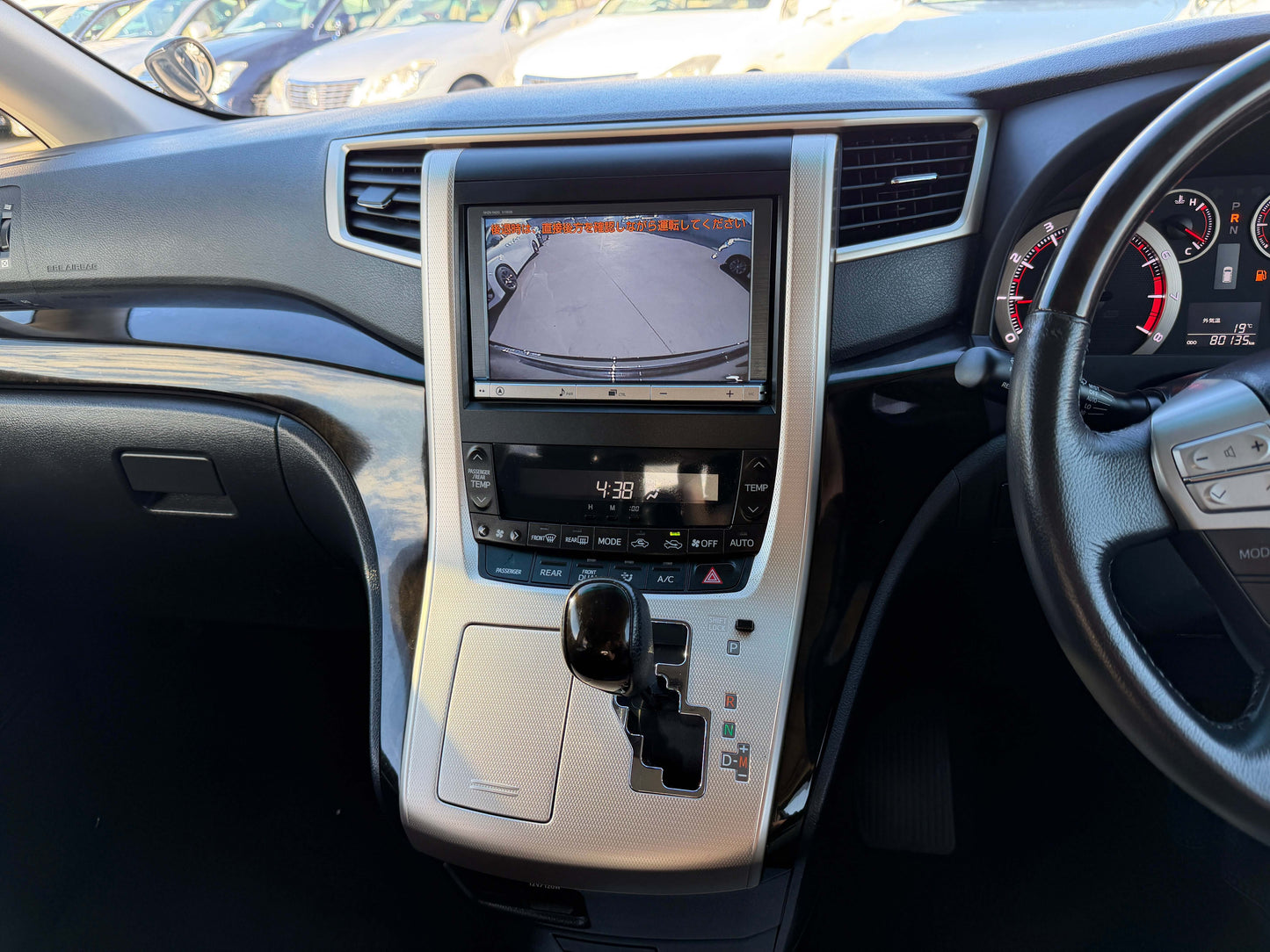 Interior dashboard view of the 2014 Toyota Vellfire 2.4L Z Golden Eyes II Edition, featuring a rearview camera.