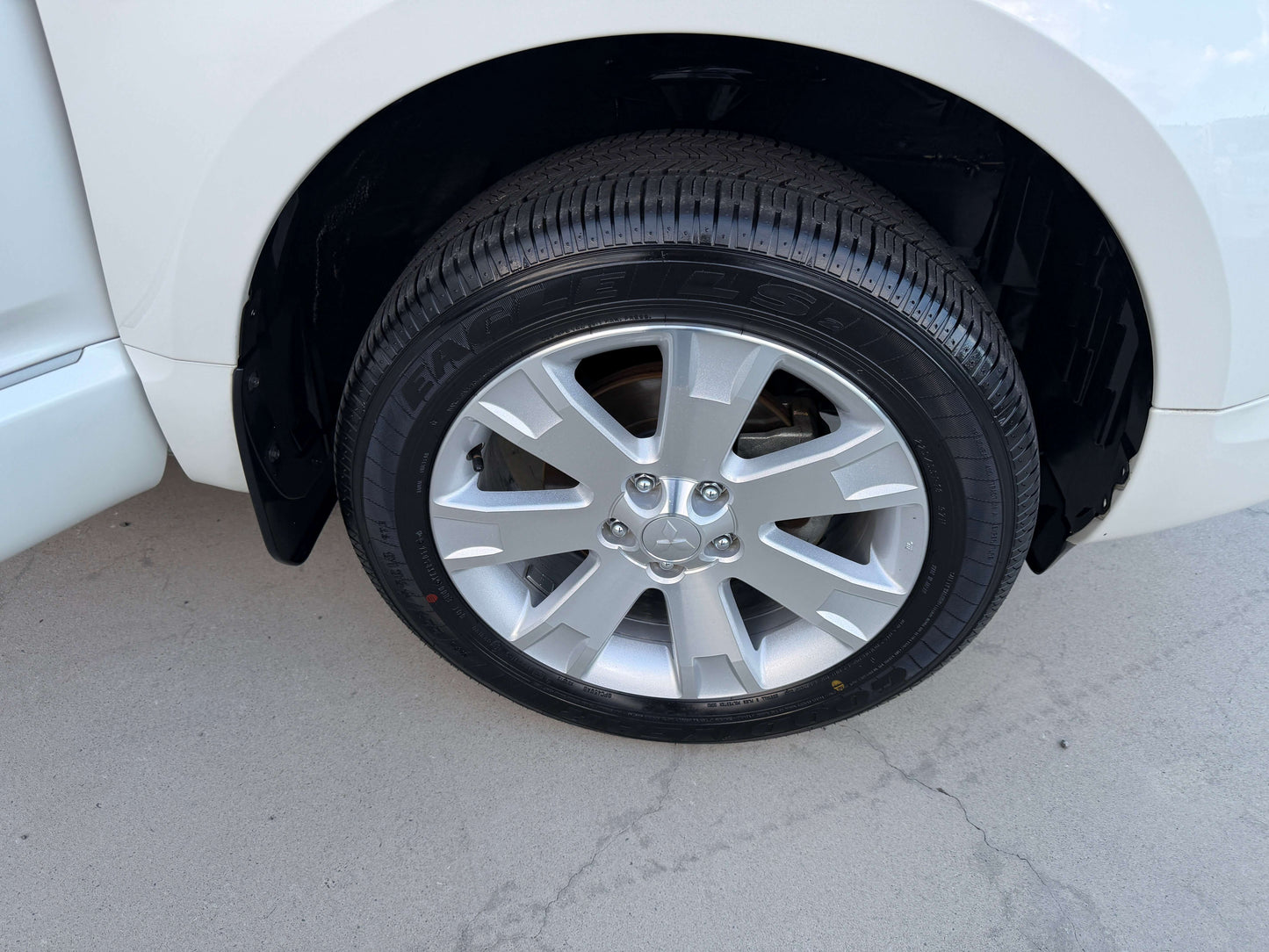 Close-up of the wheel of a 2017 Mitsubishi Delica D5 2.3 Diesel-Turbo 4WD showcasing the alloy rim and tire.