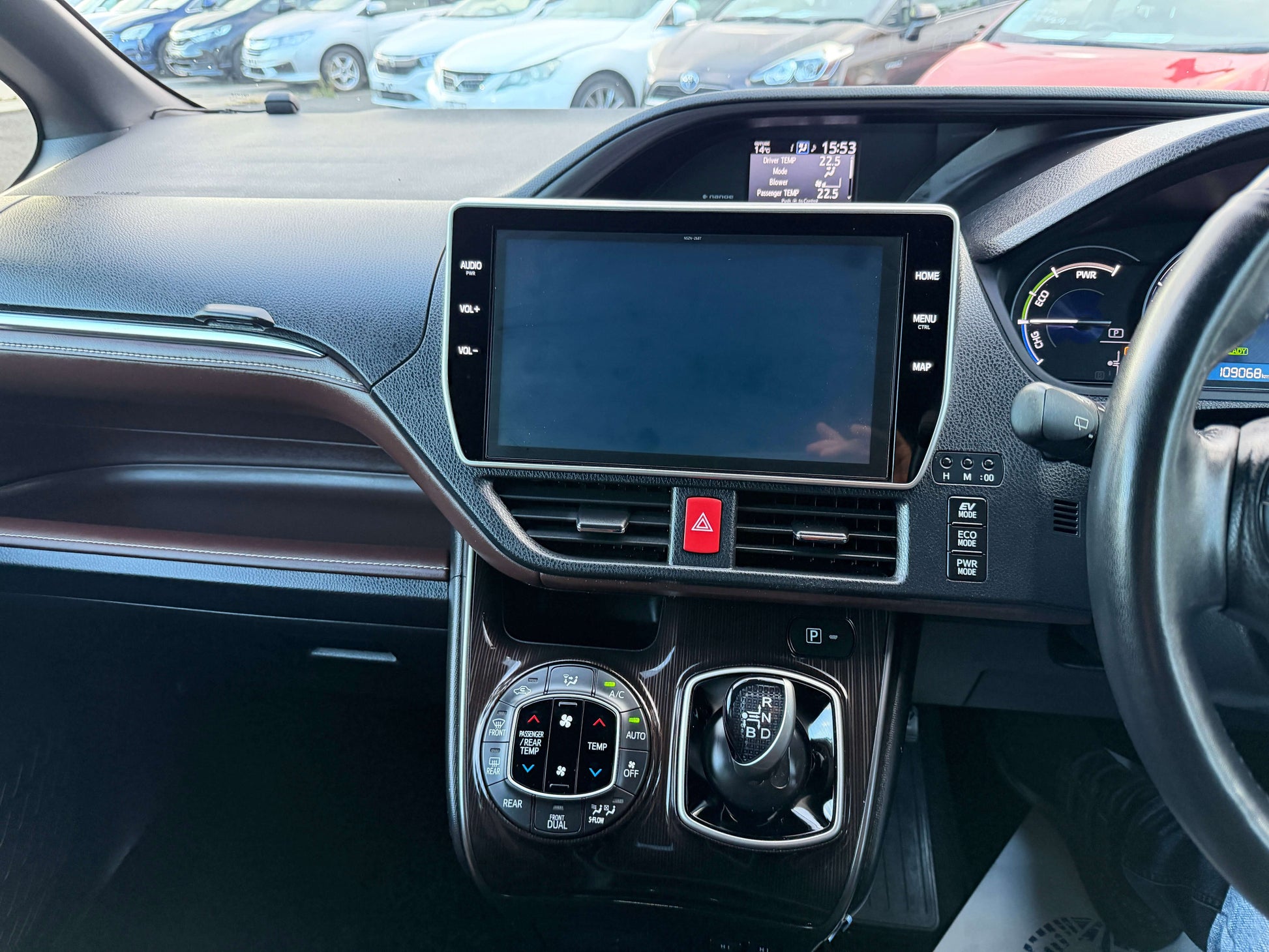 Interior view of 2018 Toyota Esquire 1.8L Hybrid Gi Premium Package featuring dashboard and touchscreen display.