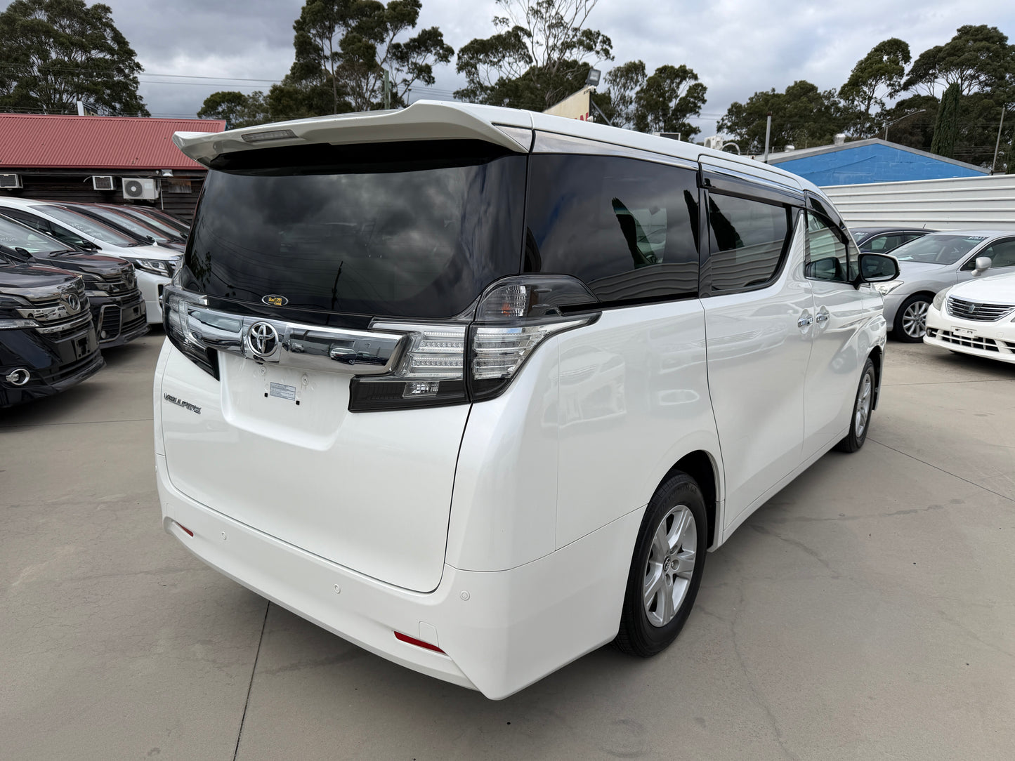 2016 Toyota Vellfire 2.5L rear quarter view with chrome accents