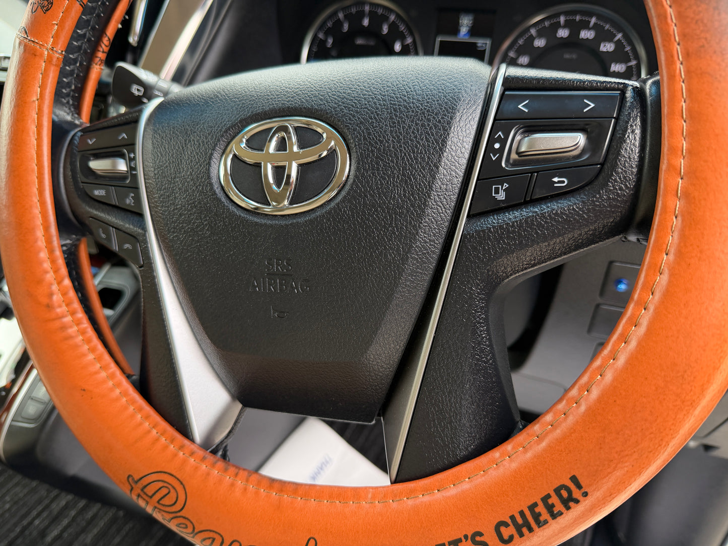 2016 Toyota Vellfire 2.5L steering wheel with Toyota logo and controls