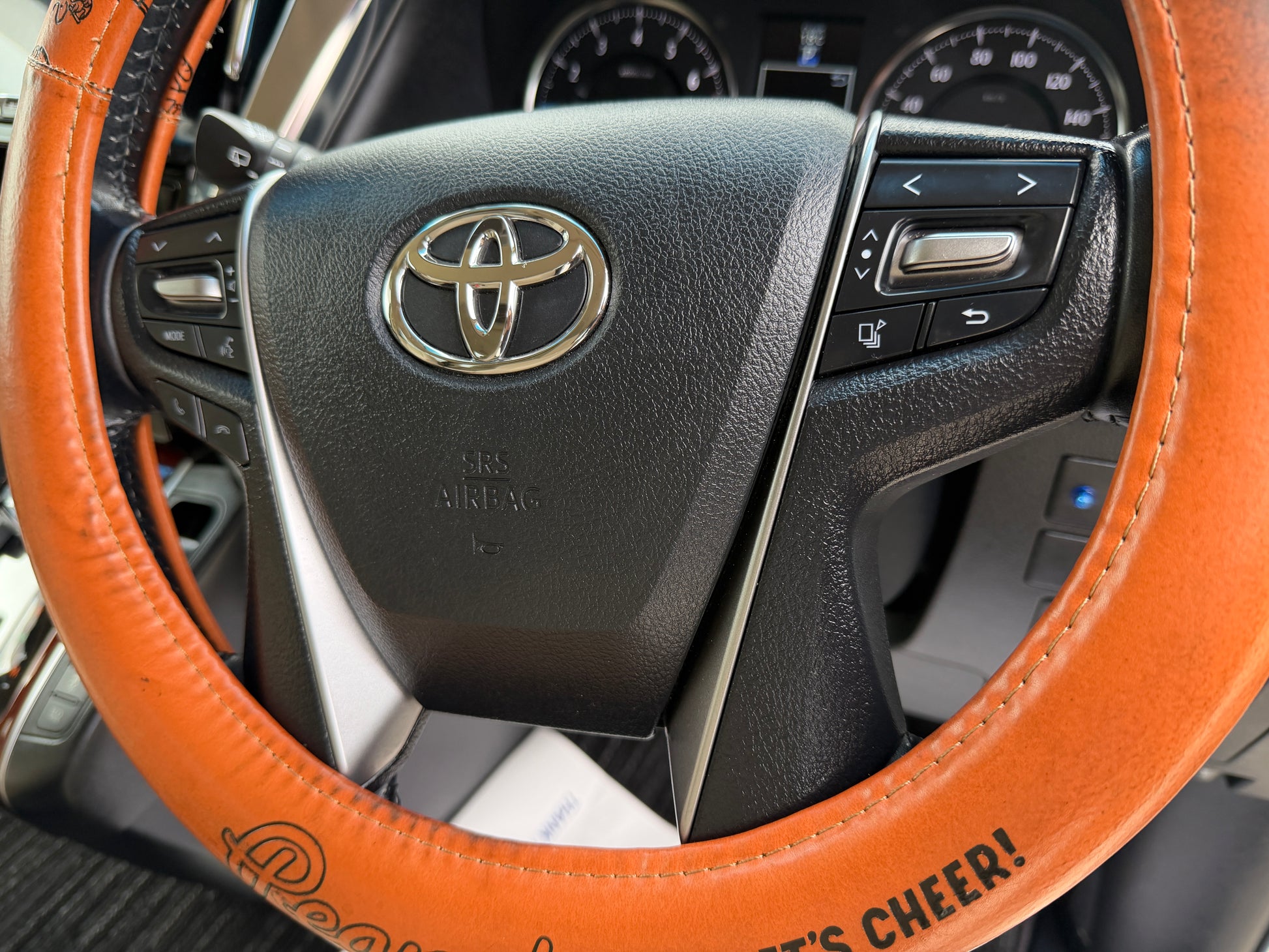 2016 Toyota Vellfire 2.5L steering wheel with Toyota logo and controls