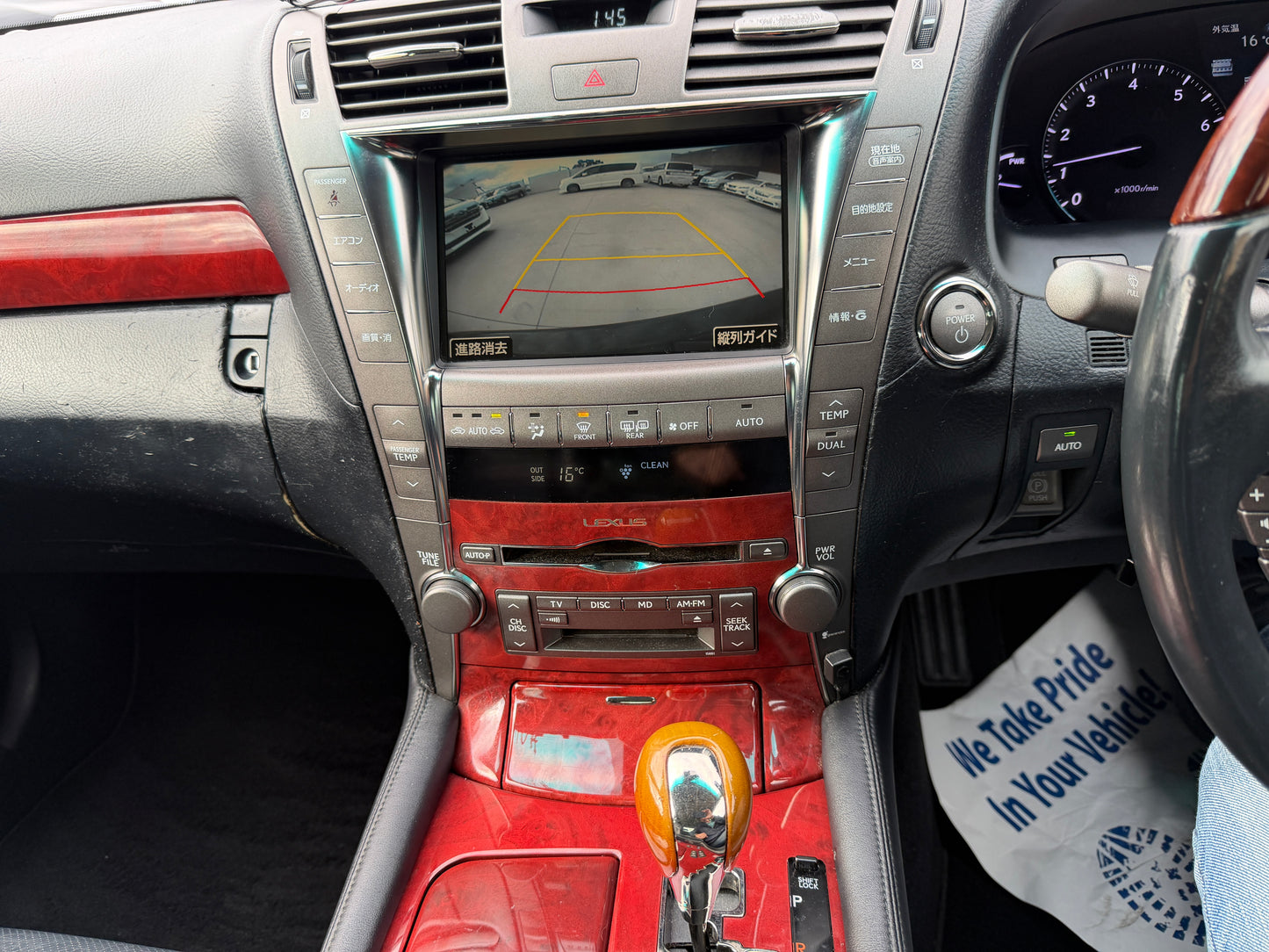 2007 Lexus LS600h AWD V8 5.0L Hybrid centre console showing reverse camera active, dual zone climate controls and audio system