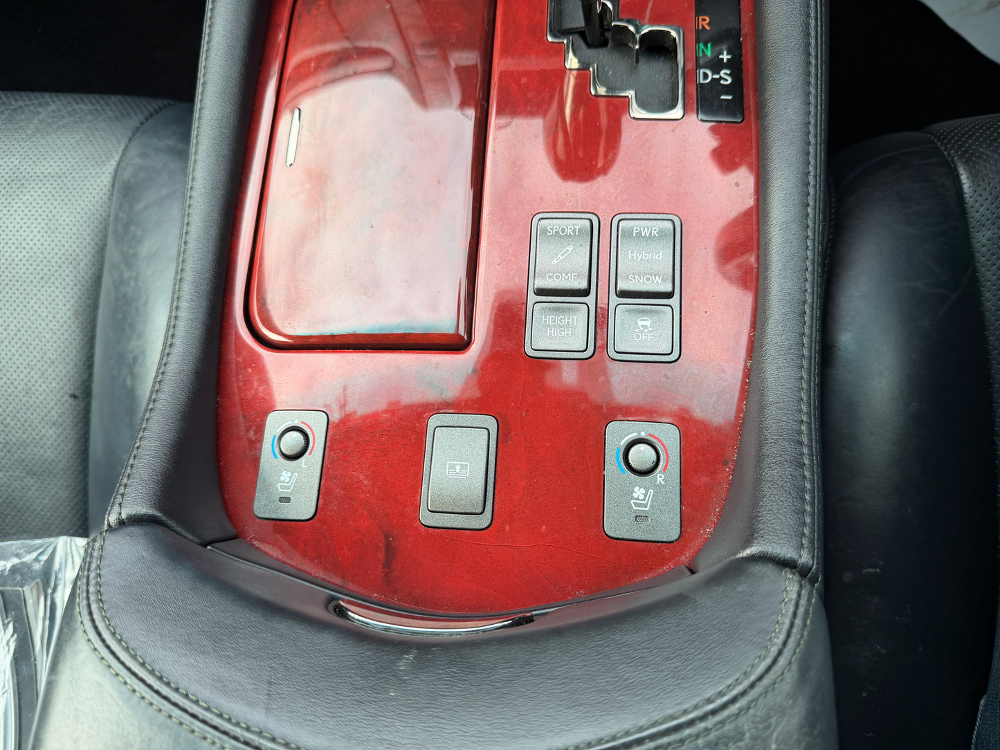 2007 Lexus LS600h AWD V8 5.0L Hybrid centre console showing Sport, Comfort, PWR Hybrid, Snow, Height High and seat heating controls