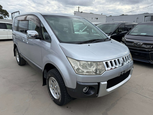 2011 Mitsubishi Delica D5 2.4 4WD Chamonix Edition silver people mover front three-quarter view with Geolandar tyres